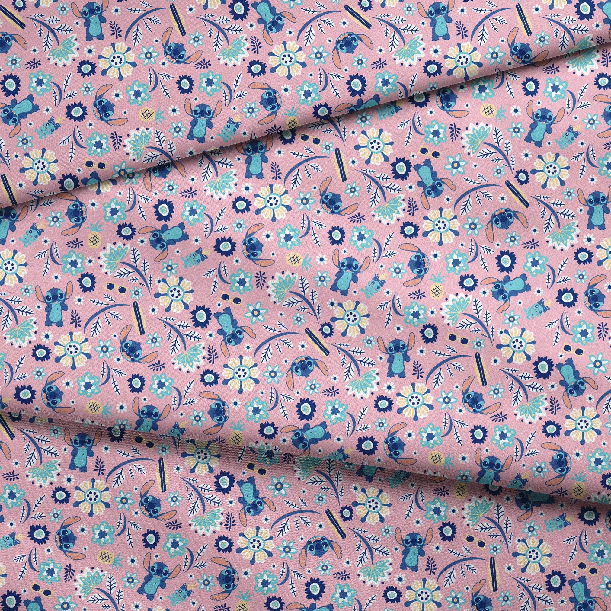 Floral pattern with Disney's Stitch, white daisies, and mint green accents on pink background fabric fold mockup