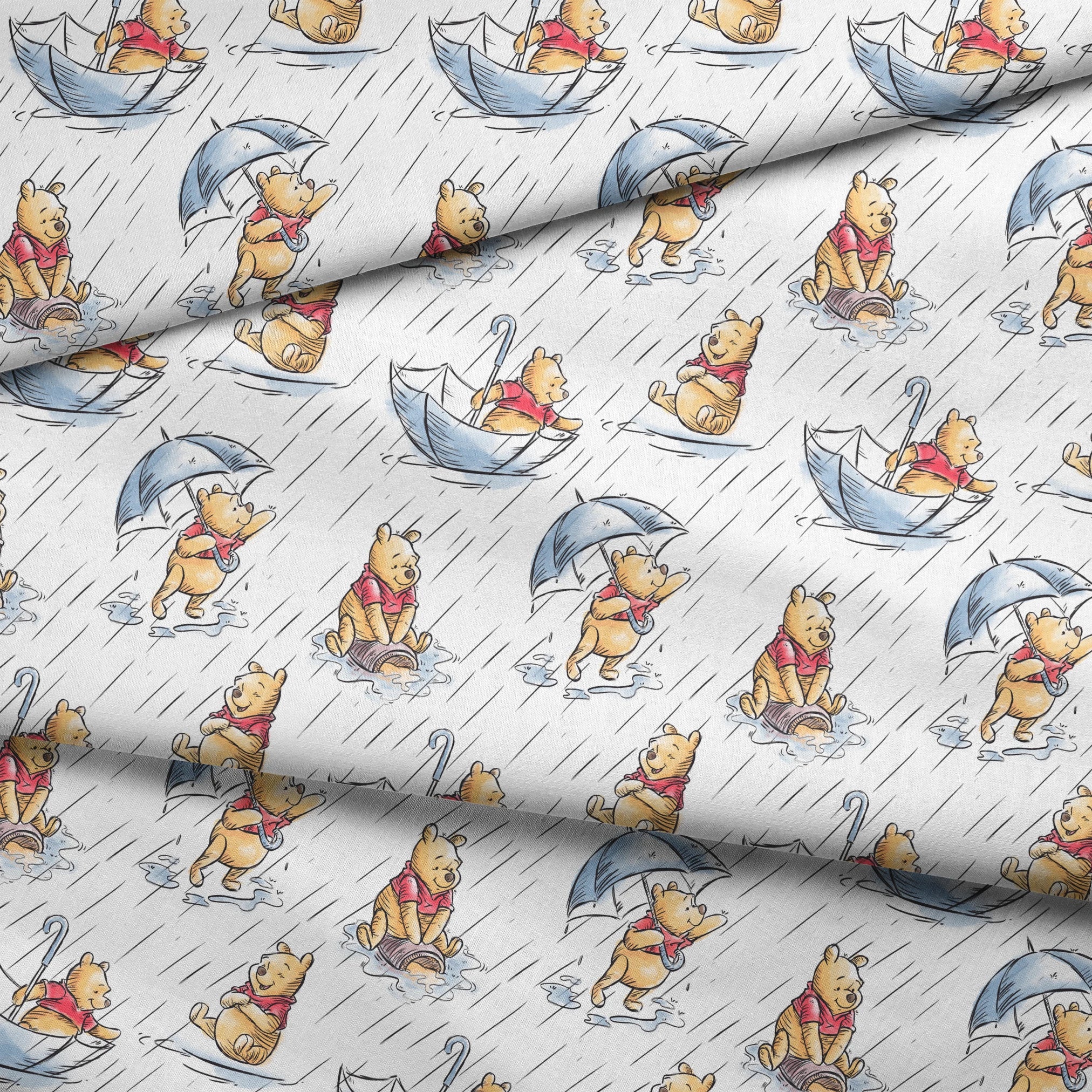 Small bear characters in a rainy scene - some holding umbrellas, others in paper boats, wearing red shirts fabric fold mockup