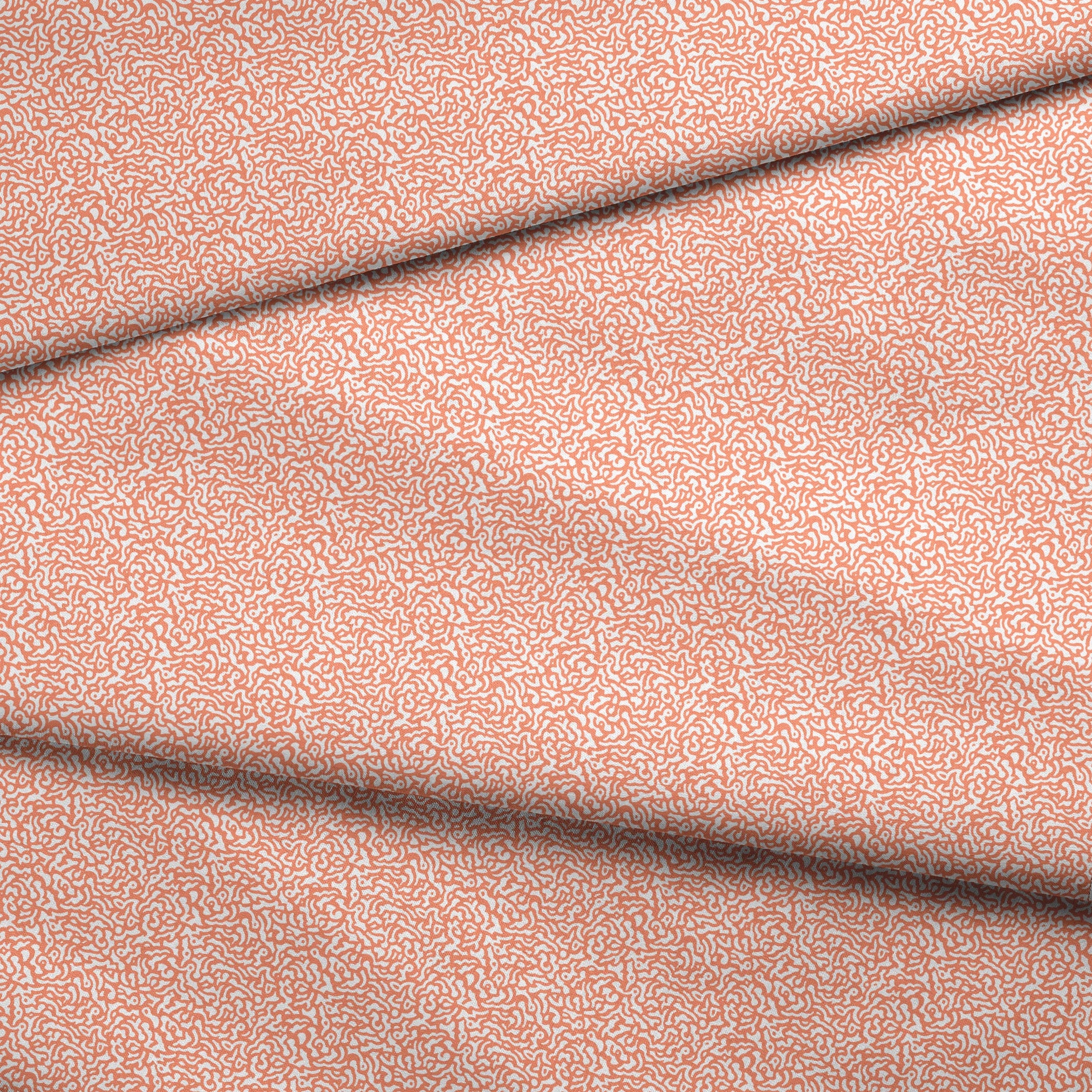 Coral squiggly pattern with organic, maze-like curves on white background fabric fold mockup