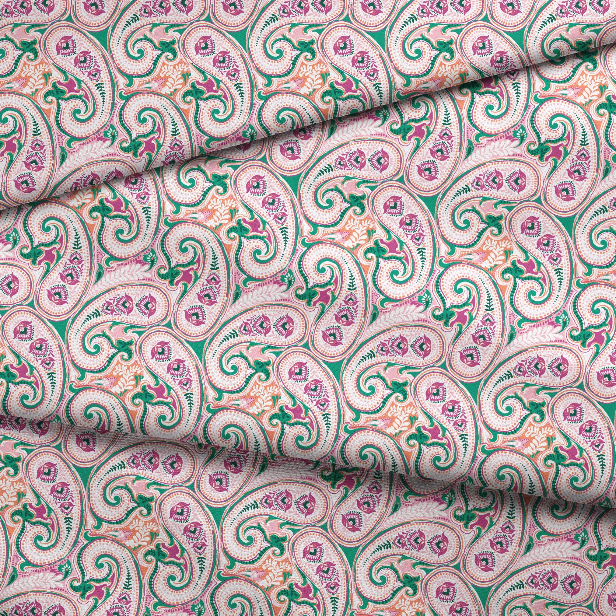 Colorful paisley pattern with swirling teardrop shapes in pink, green, and orange on light background fabric fold mockup
