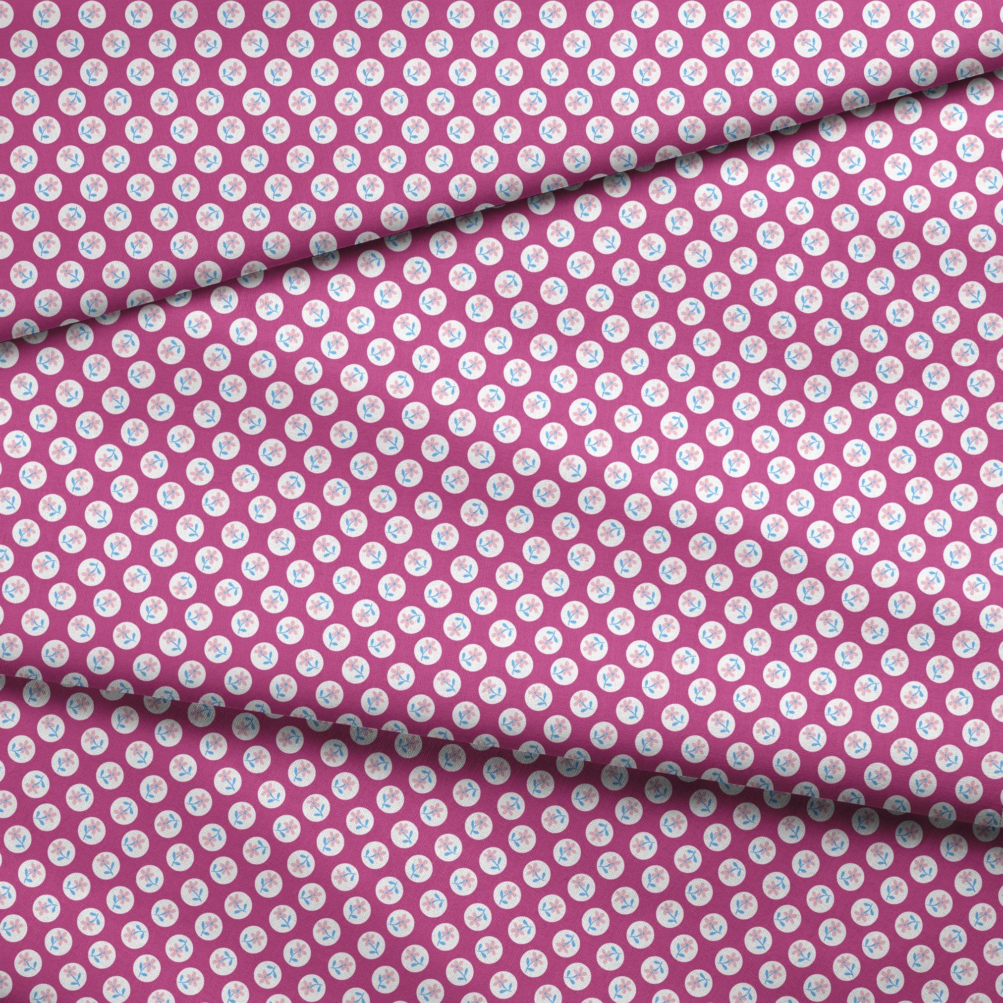 White circular dots with pink flowers and blue leaves pattern on vibrant magenta background fabric fold mockup