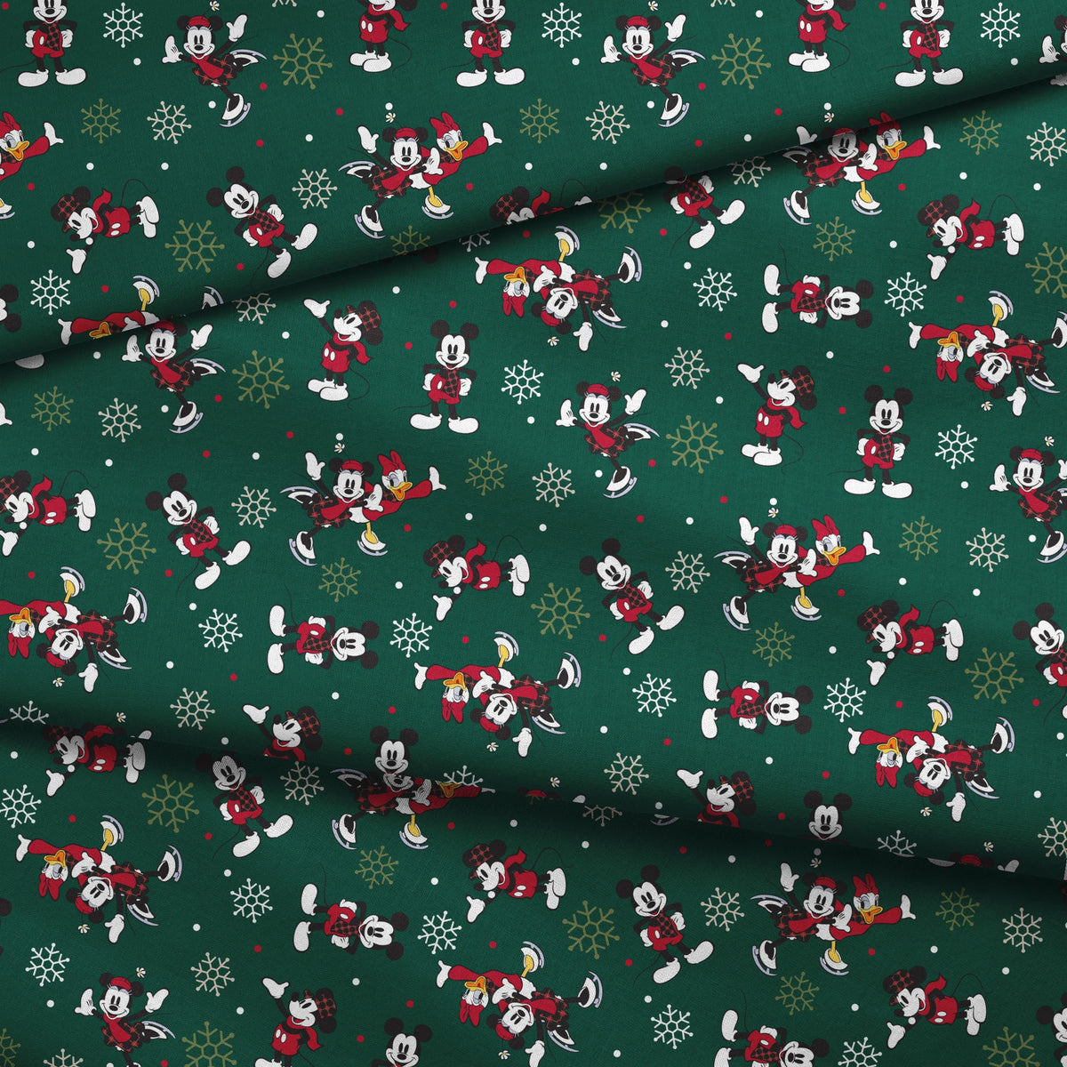 Mickey Mouse Christmas pattern with cartoon characters in winter outfits on green background with snowflakes fabric fold mockup
