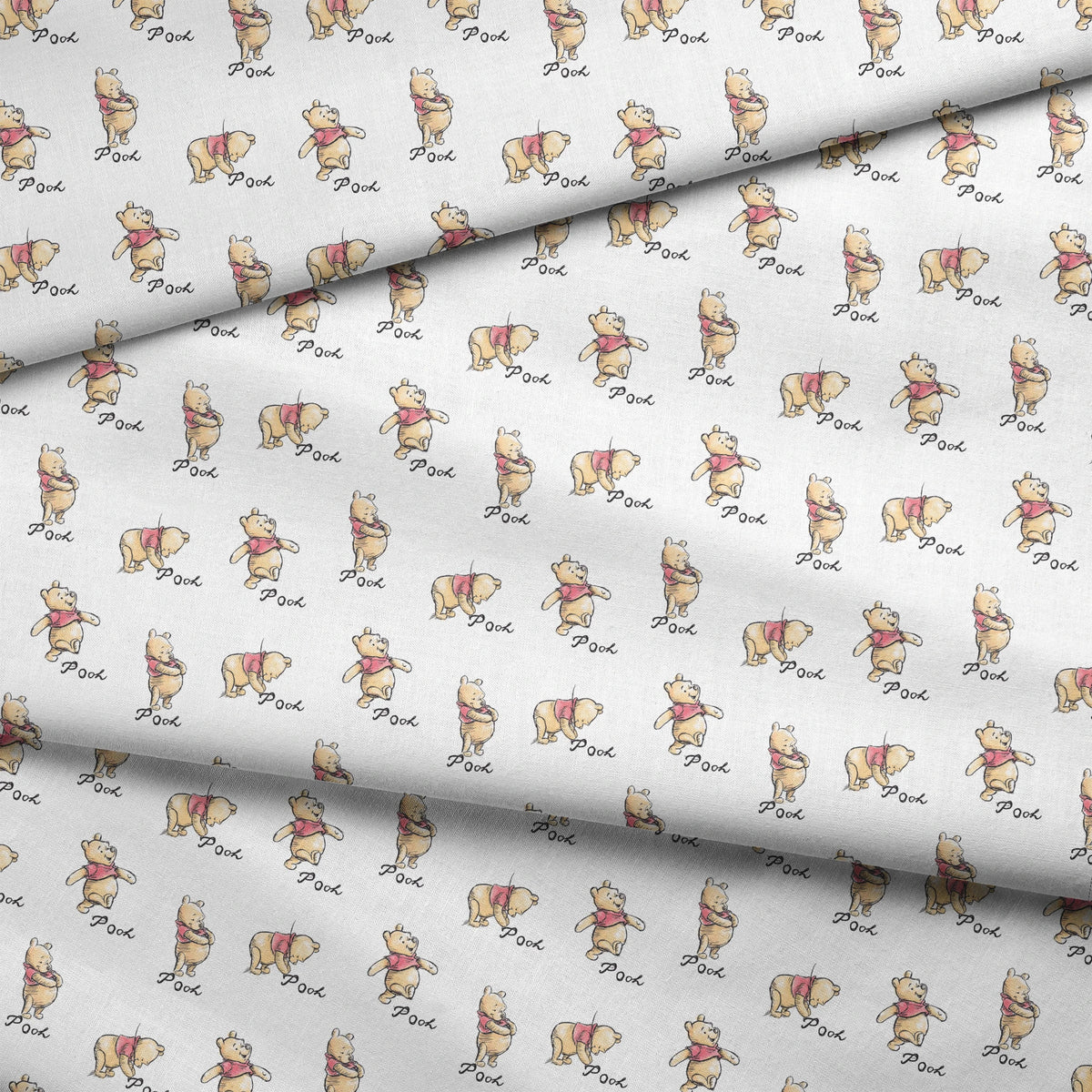 Winnie the Pooh pattern featuring cute yellow bears with red shirts in various poses, labeled "Pooh fabric fold mockup