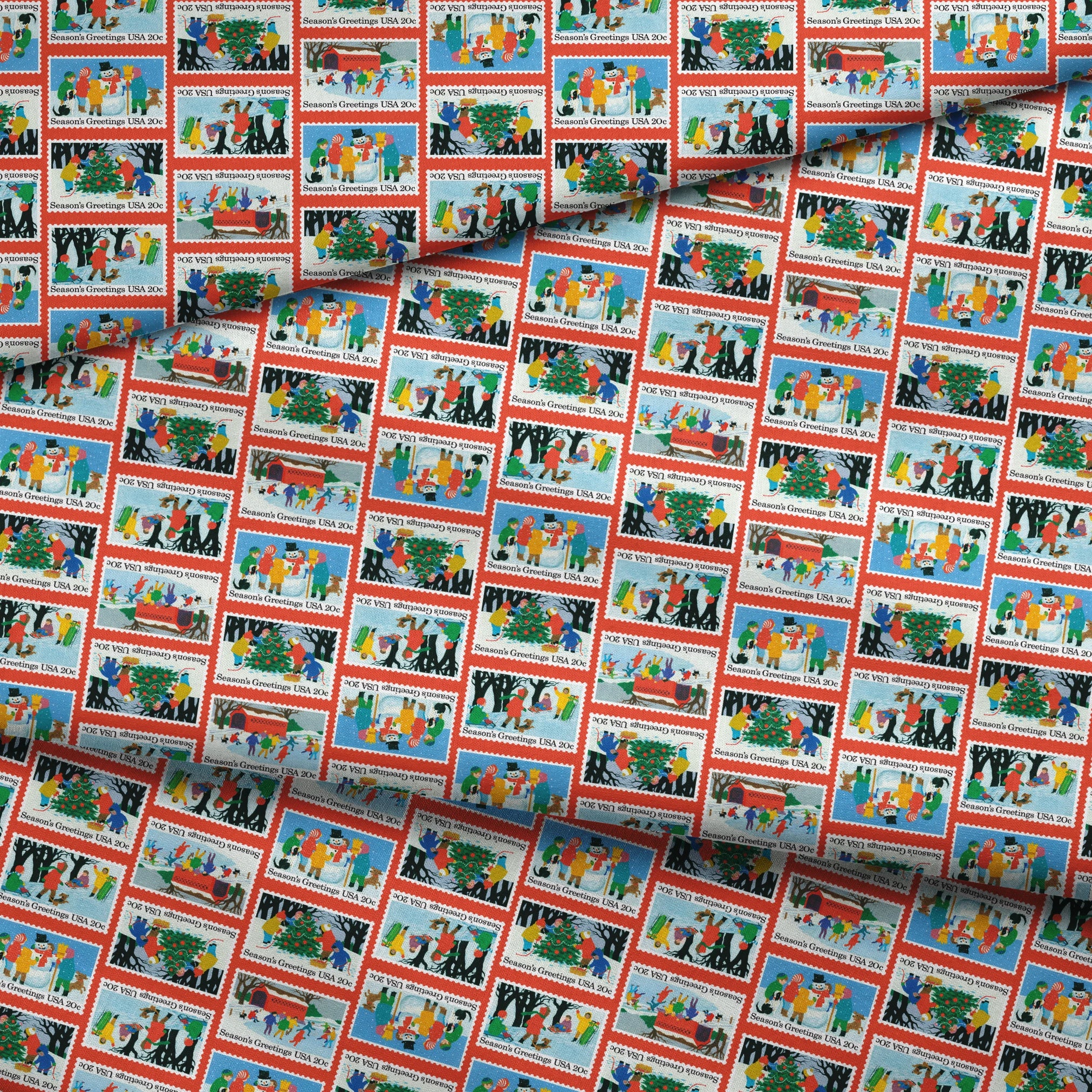 USPS Scenic Season's Greetings Stamps on Red Fabric