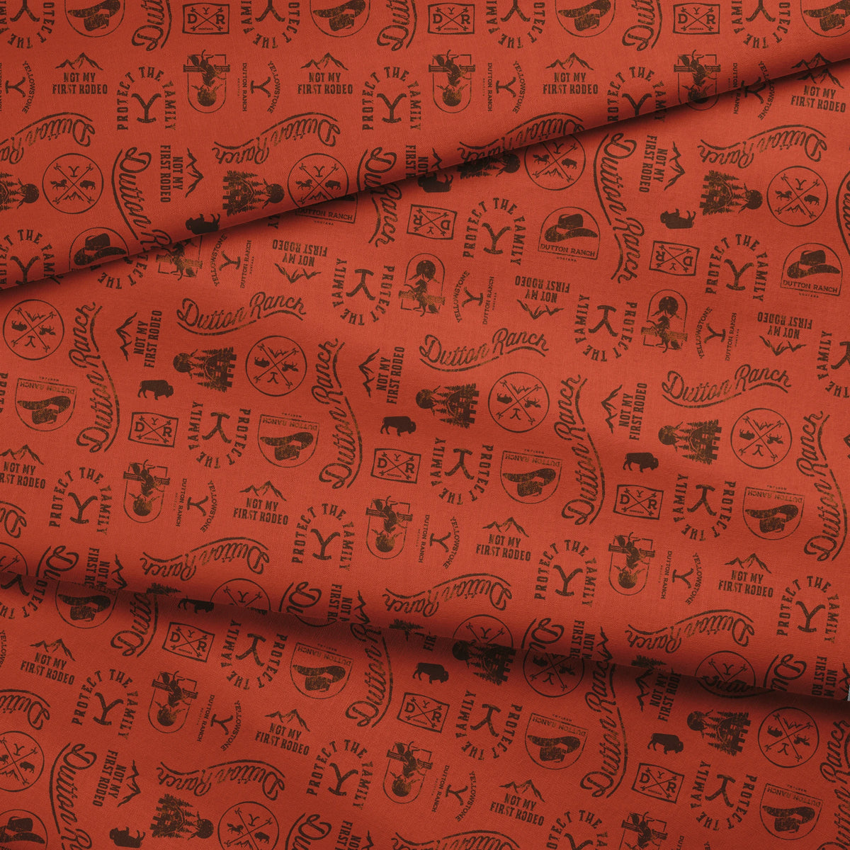 Paramount Yellowstone Dutton Ranch Icons on Rust Fabric