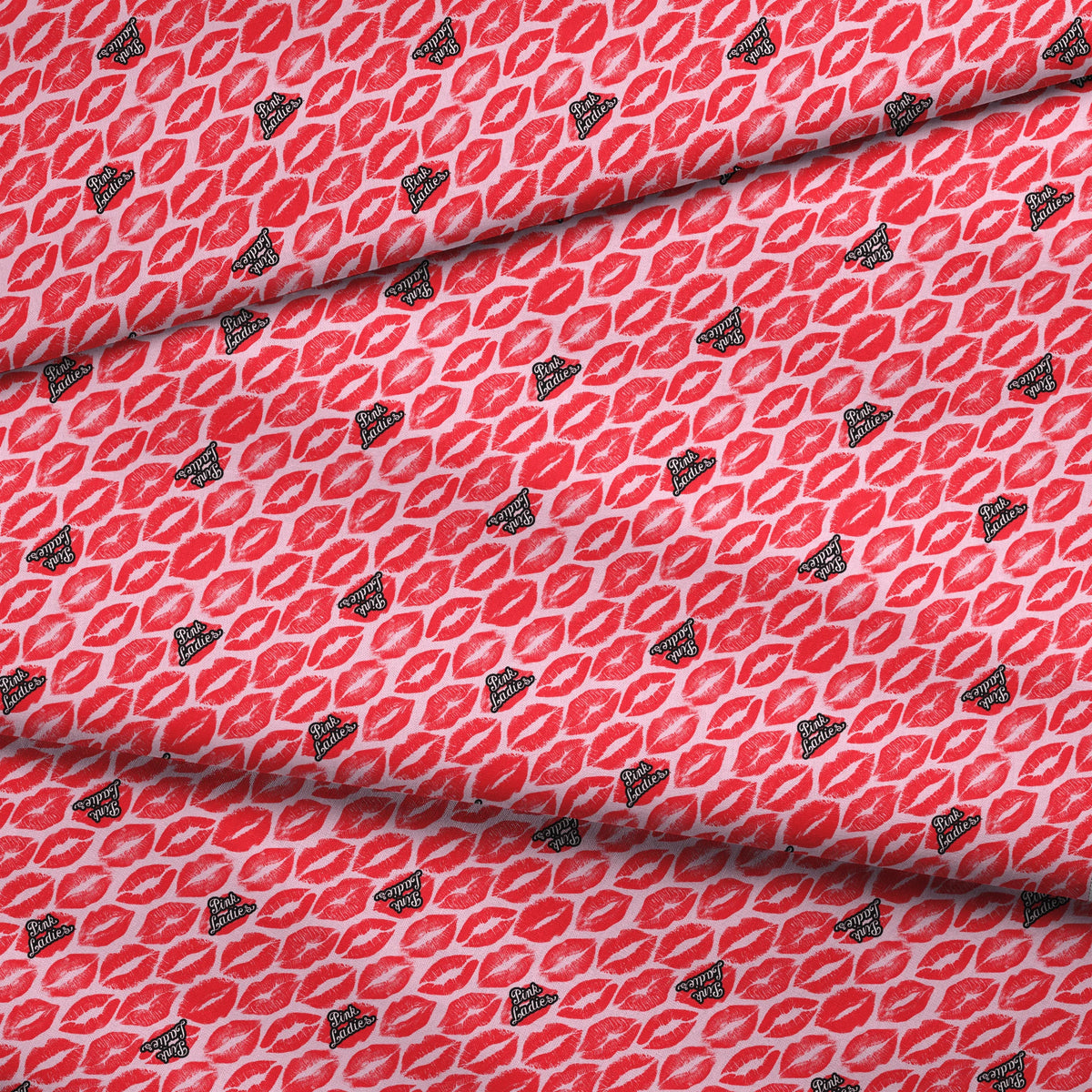 Paramount Grease  Pink Ladies Lipstick on Red Fabric