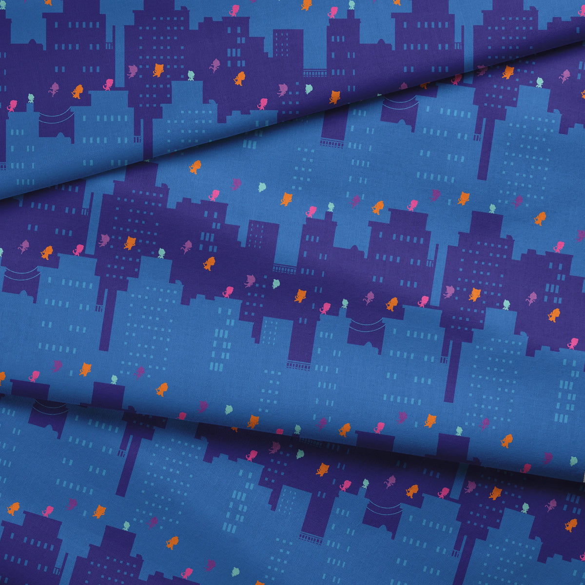 Disney Jr's. SuperKitties Super Skyline on Blue Fabric