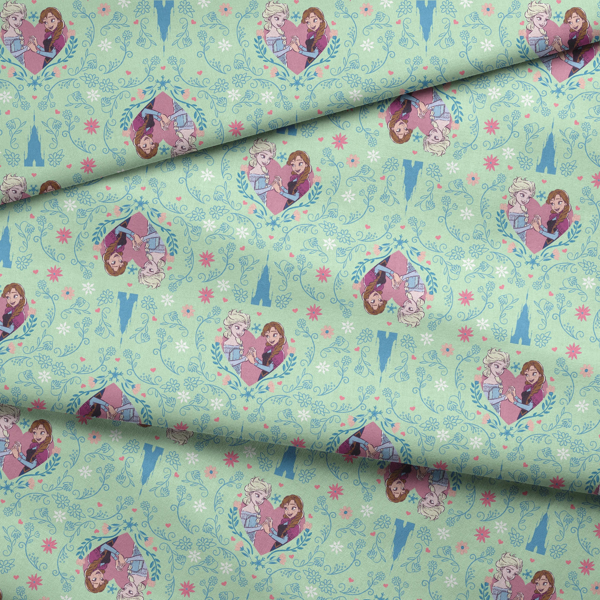 Disney Frozen  Sisterly Bond on Green Fabric