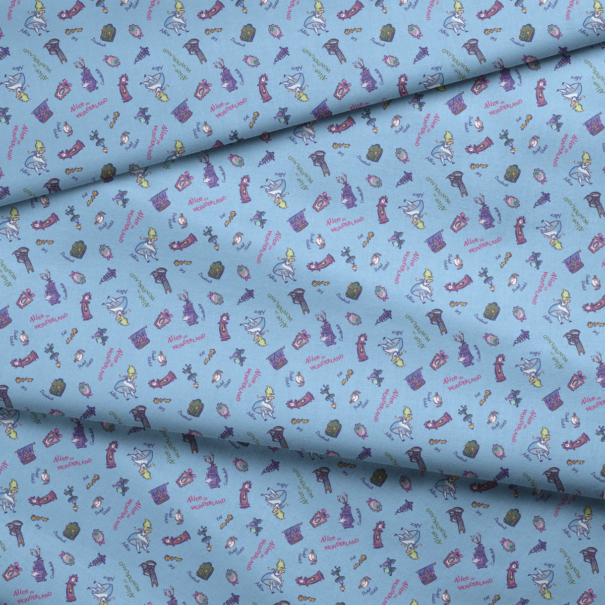 Disney Alice in Wonderland  Down the Rabbit Hole on Blue Fabric