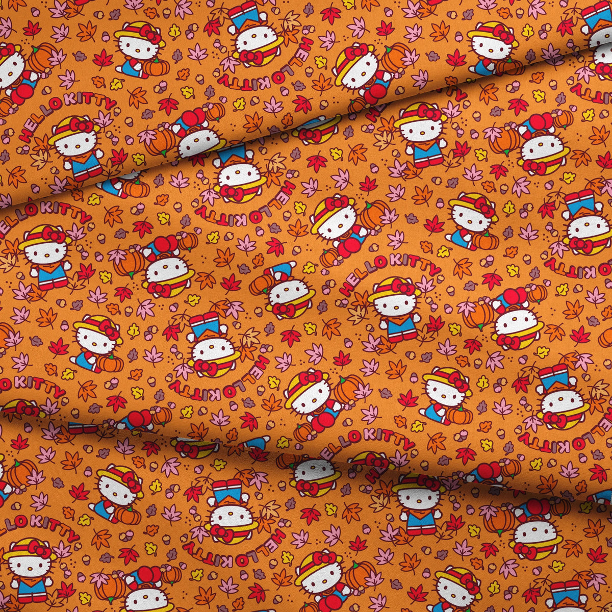 Hello Kitty® Autumn Leaves on Orange Fabric