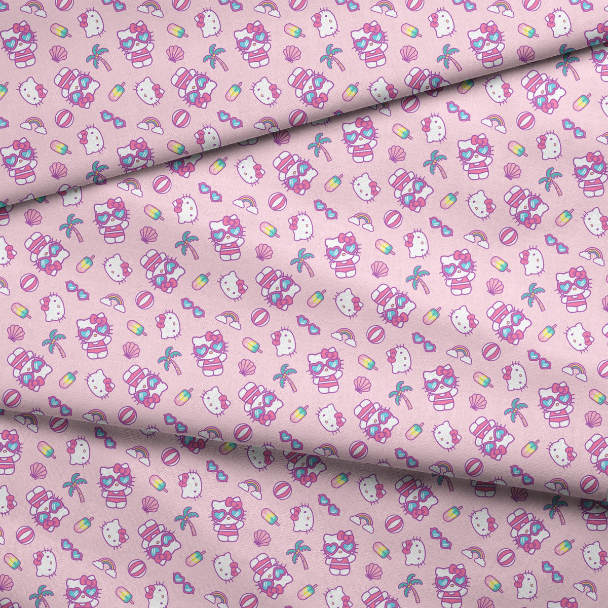 Hello Kitty® Beach Day Fun on Pink Fabric