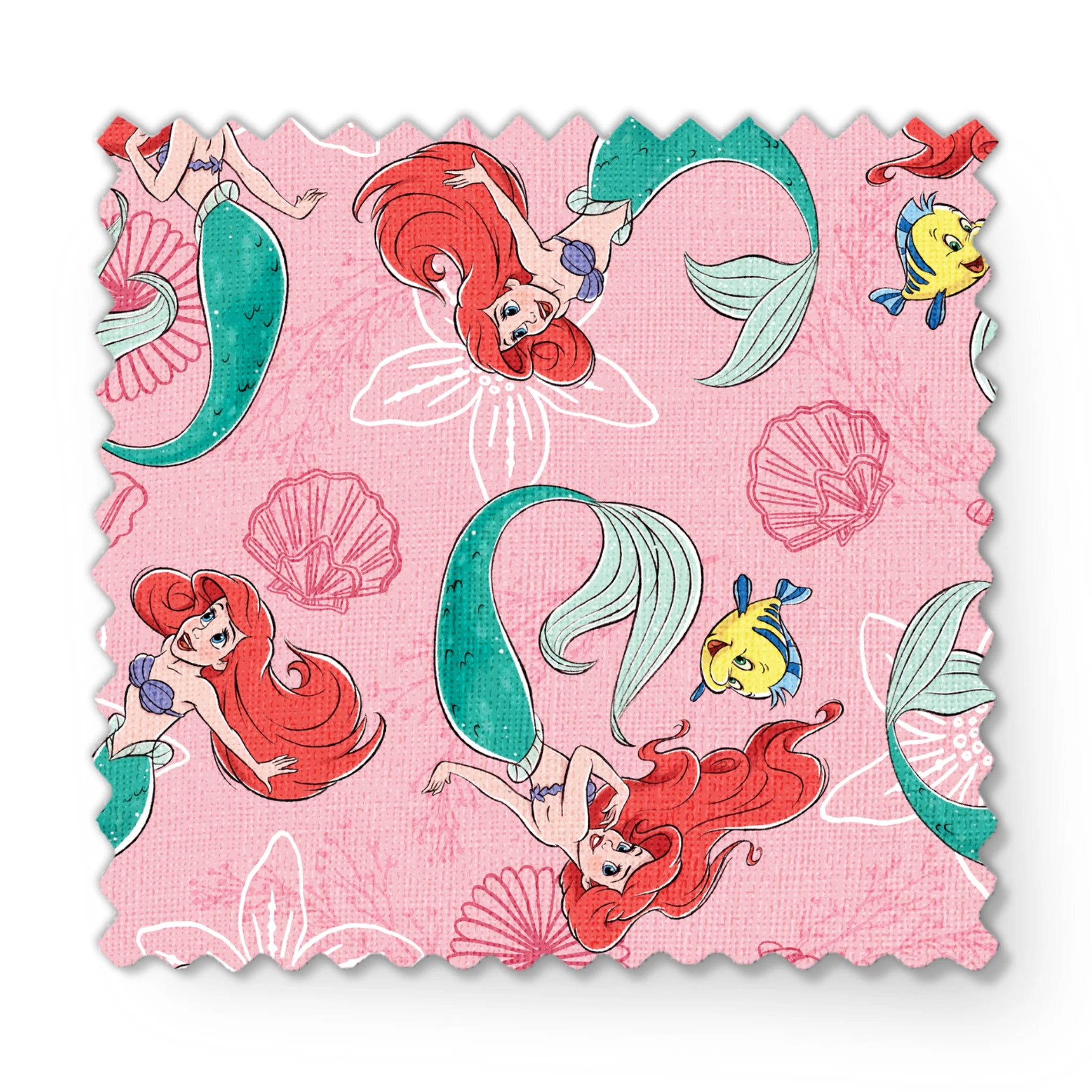 Illustrated pattern of mermaids with red hair and green tails swimming with yellow fish on pink seashell background fabric swatch mockup