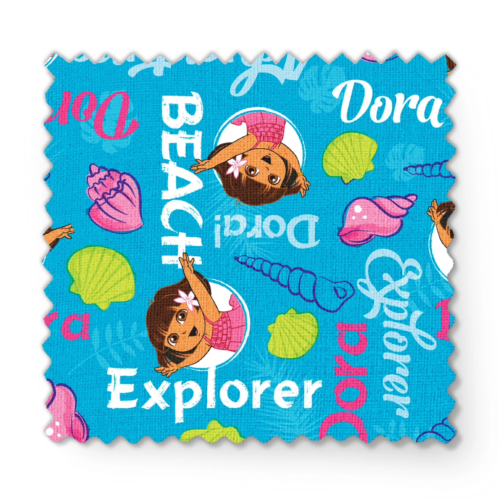 Bright blue pattern featuring Dora the Explorer cartoon character with seashells and "Beach Explorer" text fabric swatch mockup