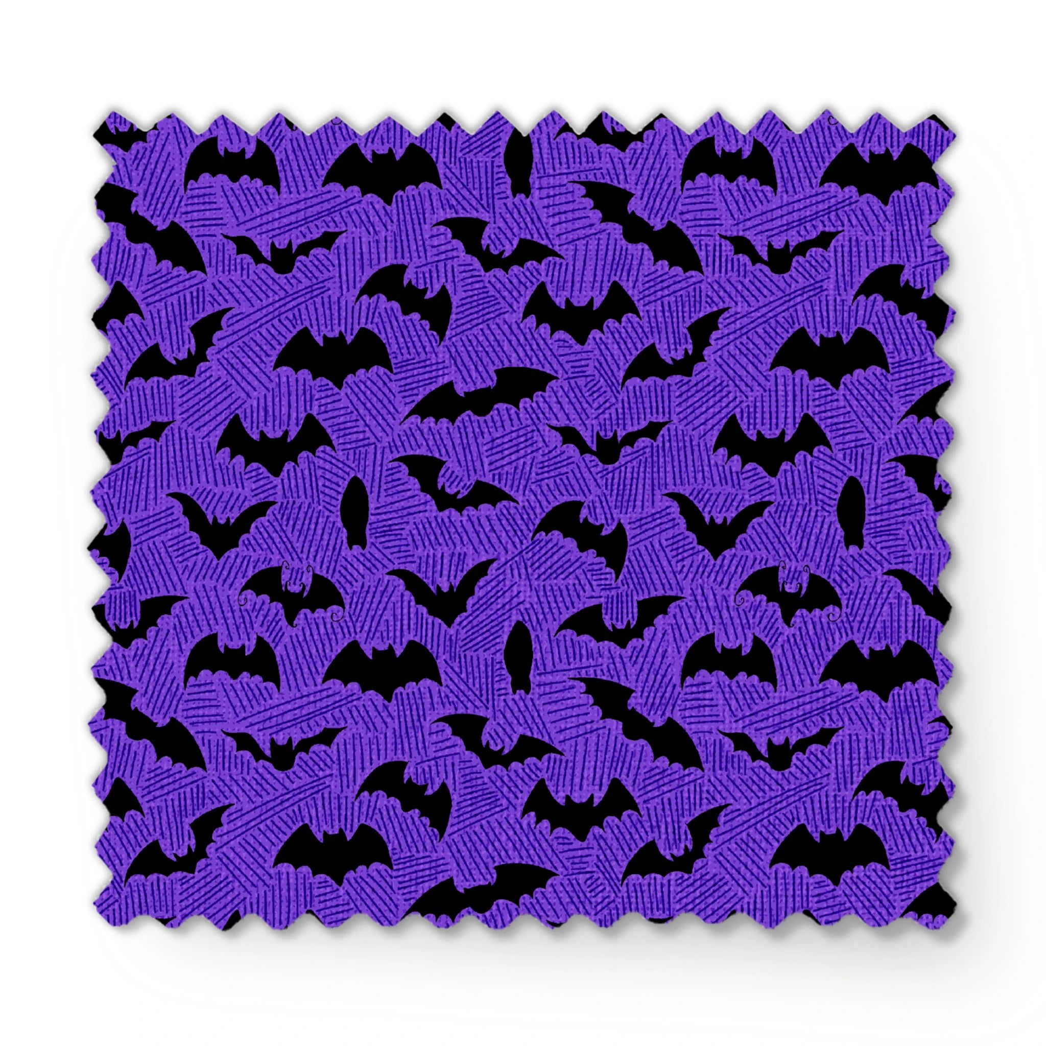 Black bat silhouettes scattered over purple zigzag background, Halloween-themed pattern fabric swatch mockup