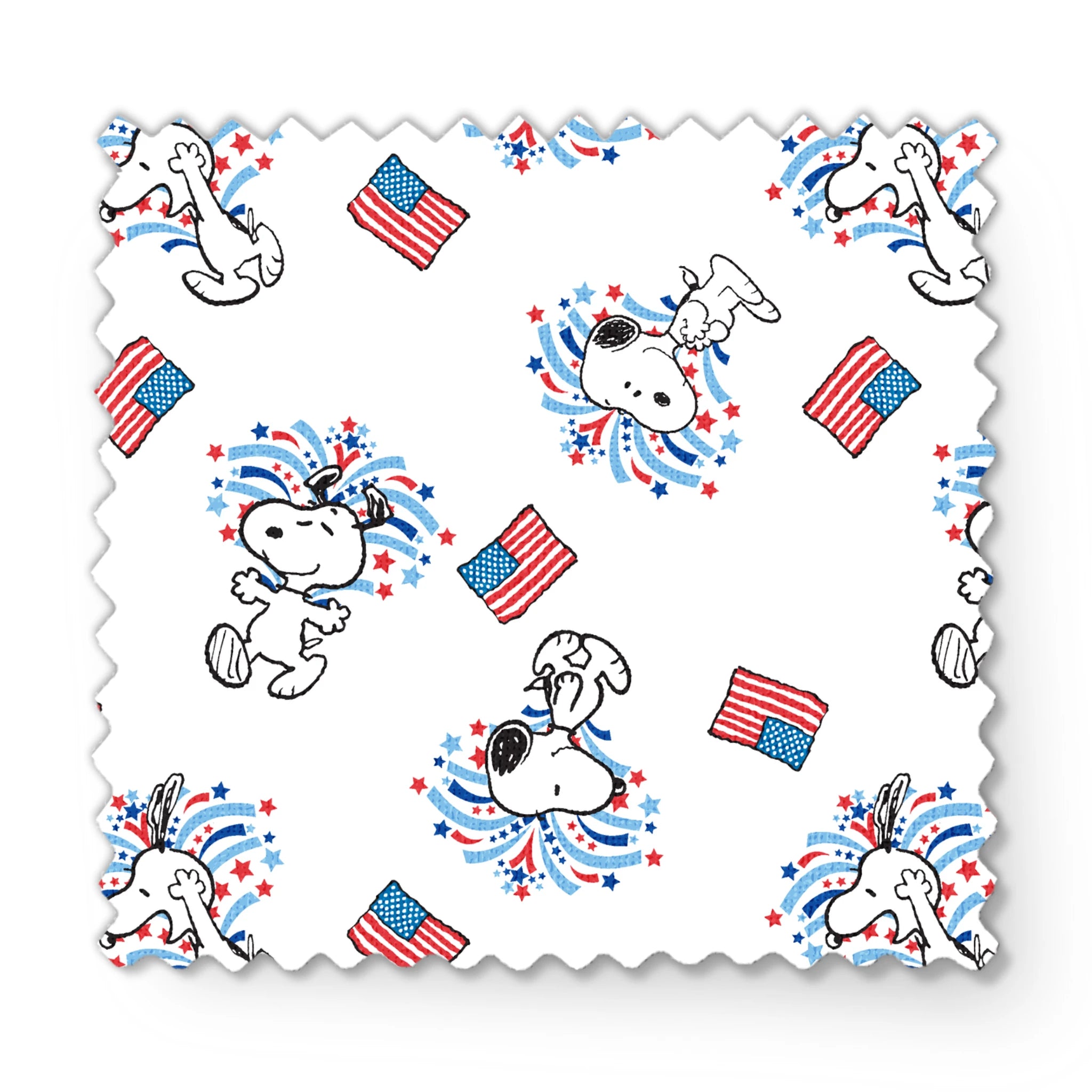 Snoopy with red and blue fireworks pattern alongside American flags on white background fabric swatch mockup