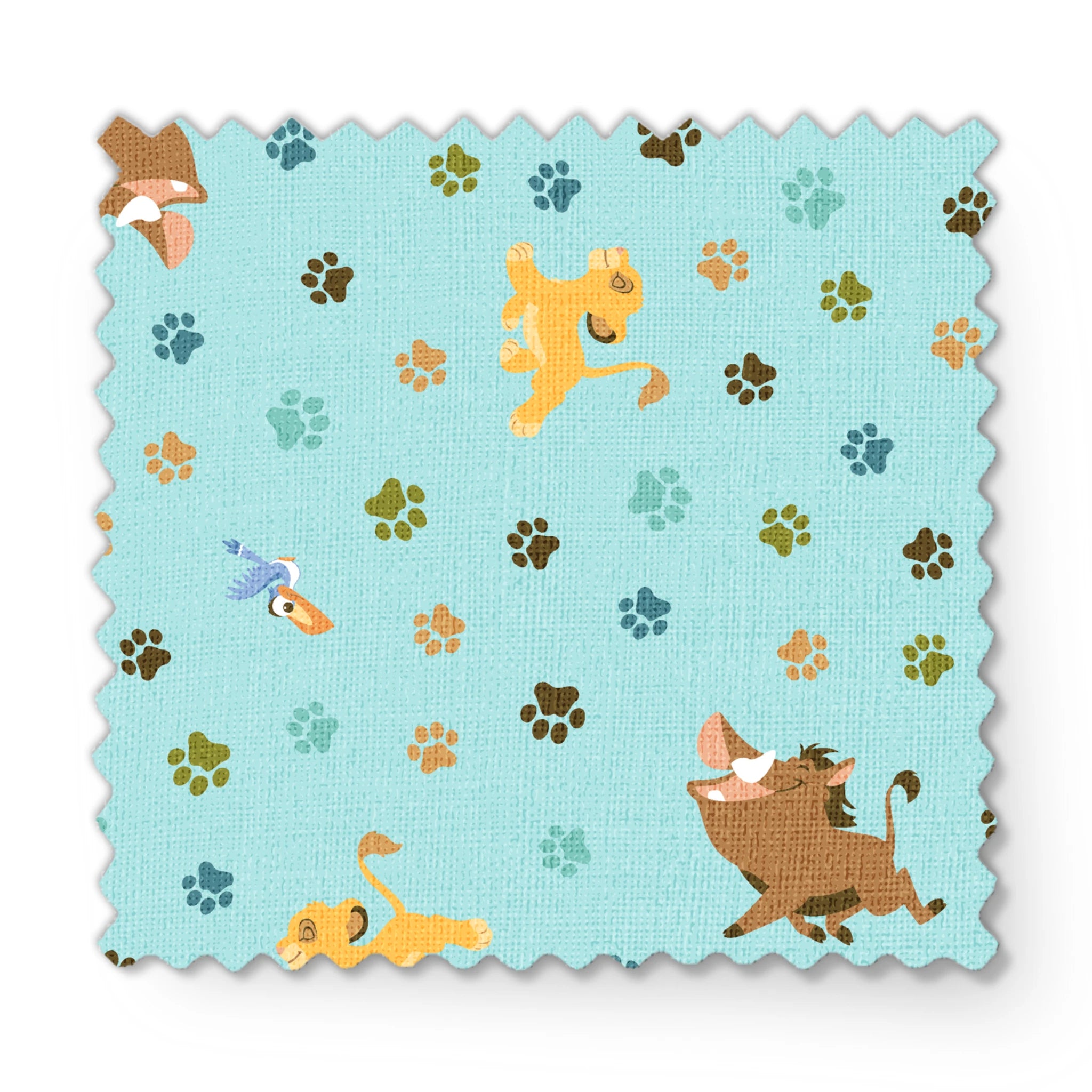 The Lion King pattern with paw prints on light blue background fabric swatch mockup