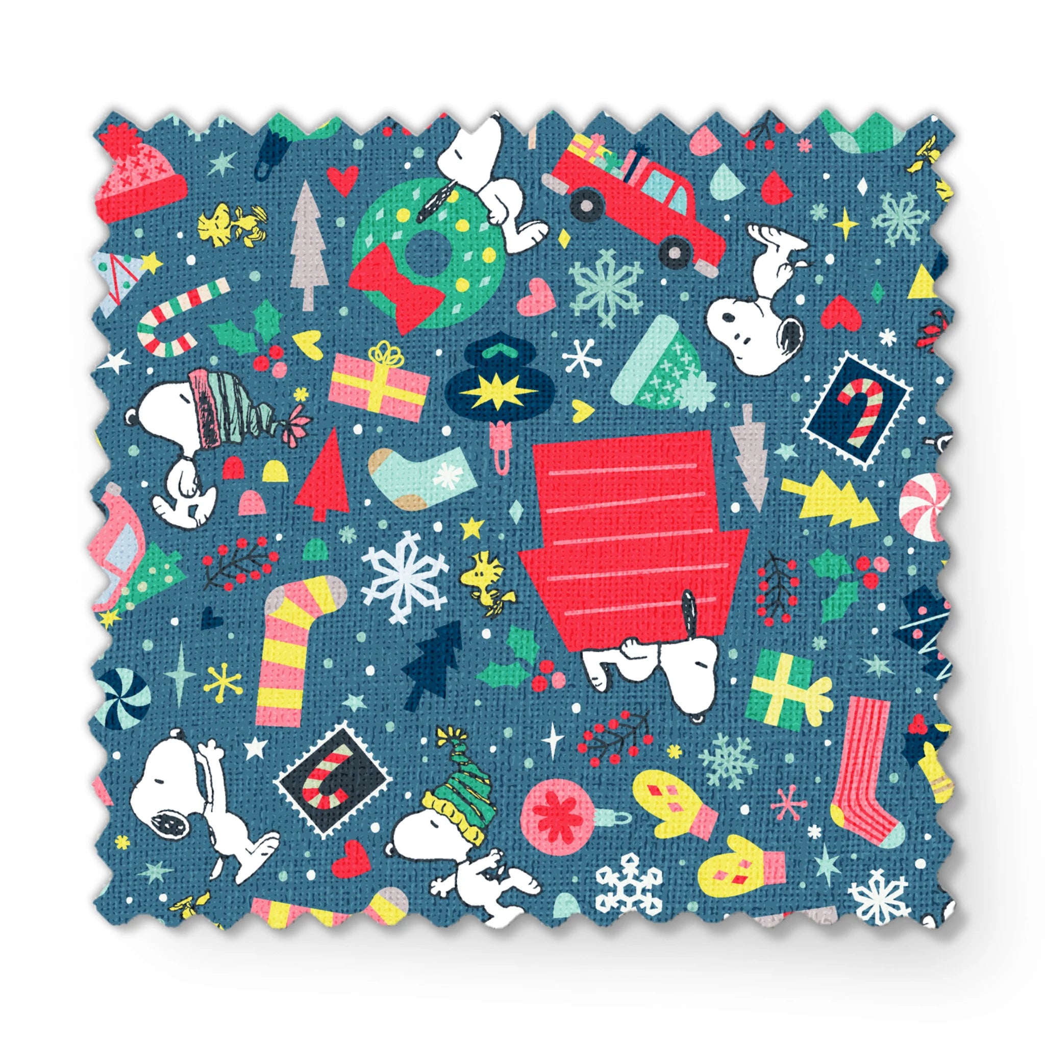 Colorful Peanuts Christmas pattern with festive icons, red mailboxes, presents, houses, and holiday symbols on teal background fabric swatch mockup