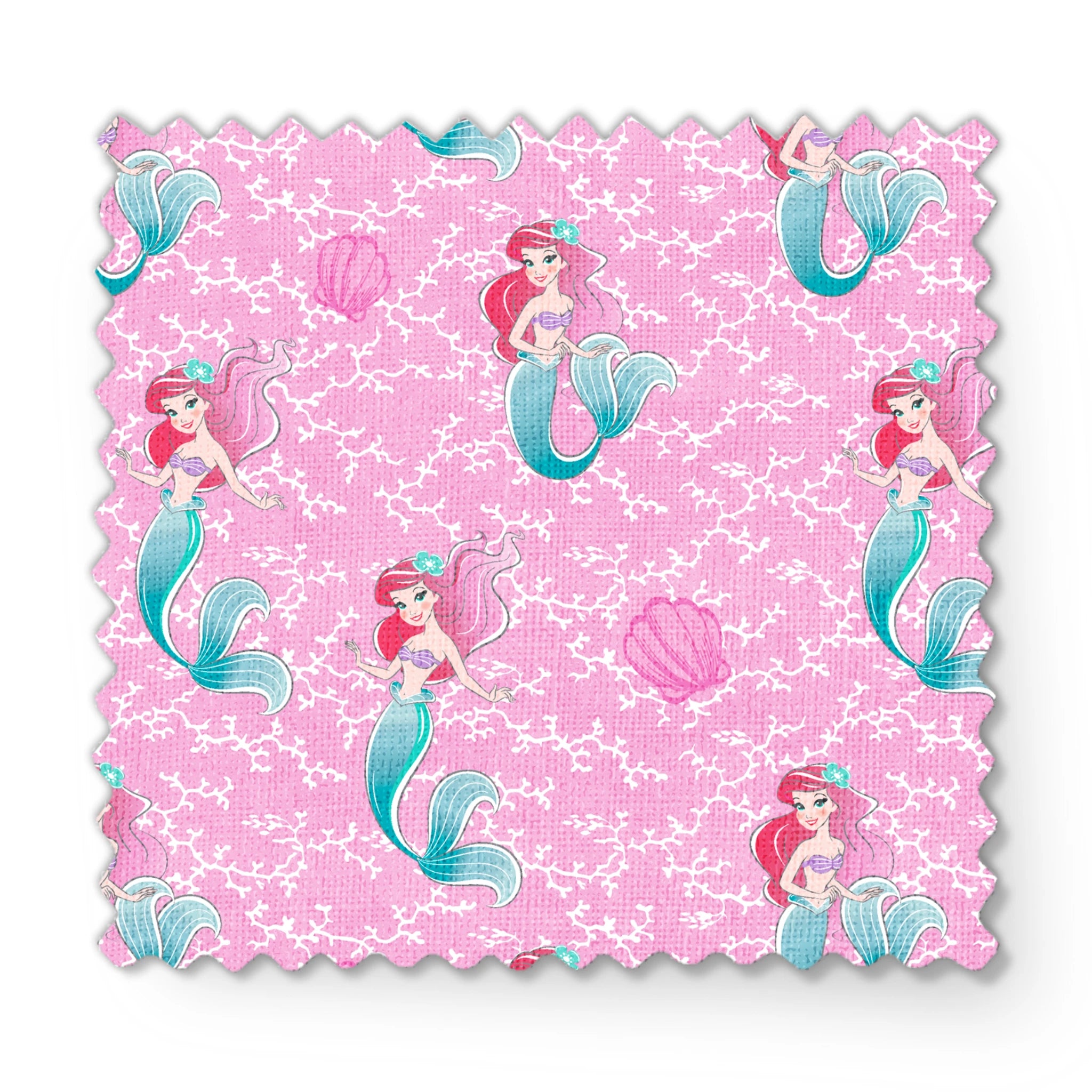 The Little Mermaid pattern with Ariel and purple seashells on pink background with white bubbles fabric swatch mockup