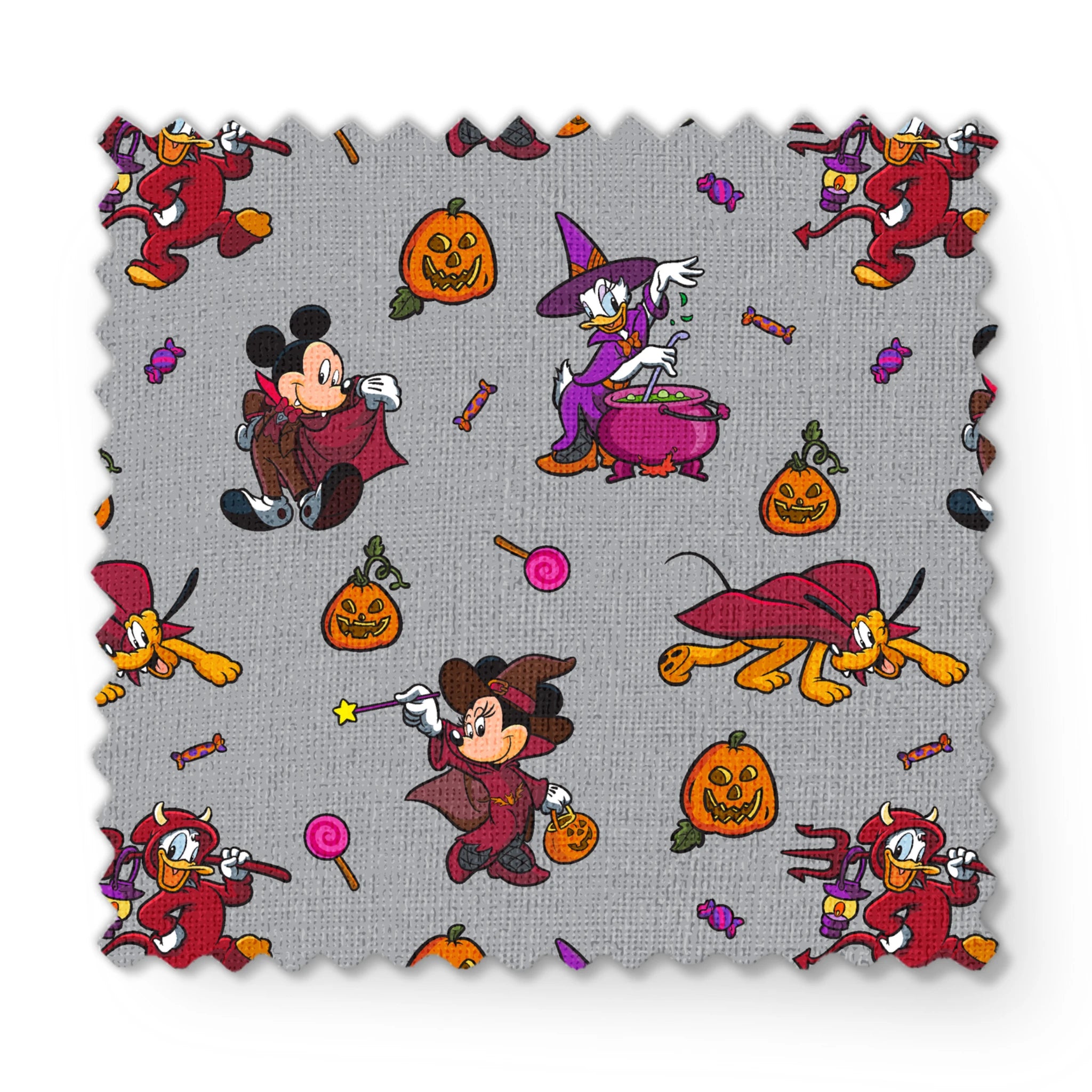 Halloween-themed cartoon pattern with Mickey Mouse characters in costumes, pumpkins, candy, and cauldrons on gray background fabric swatch mockup
