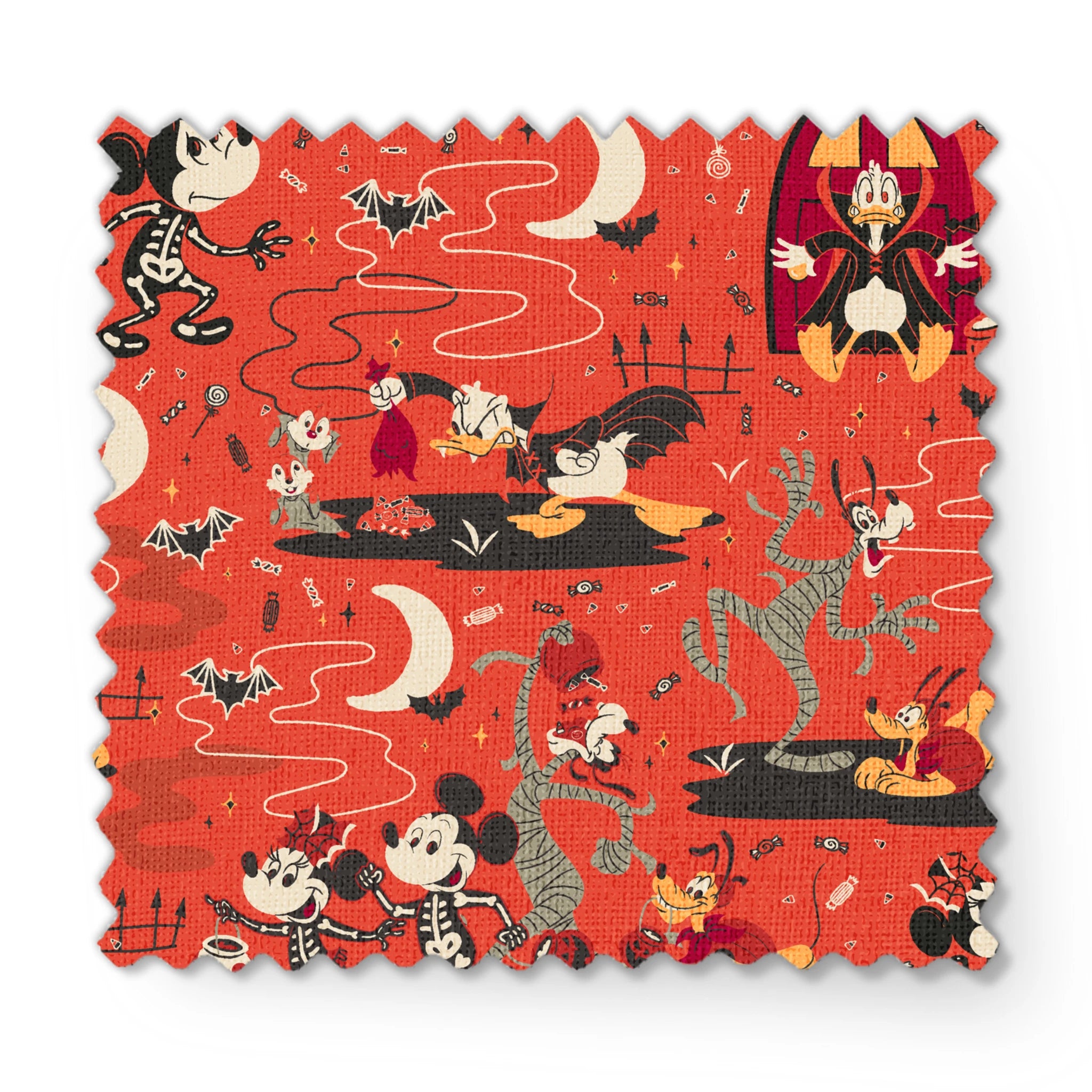 Halloween-themed Disney pattern with Mickey, Minnie, Donald in skeleton costumes on orange background with bats and moons fabric swatch mockup
