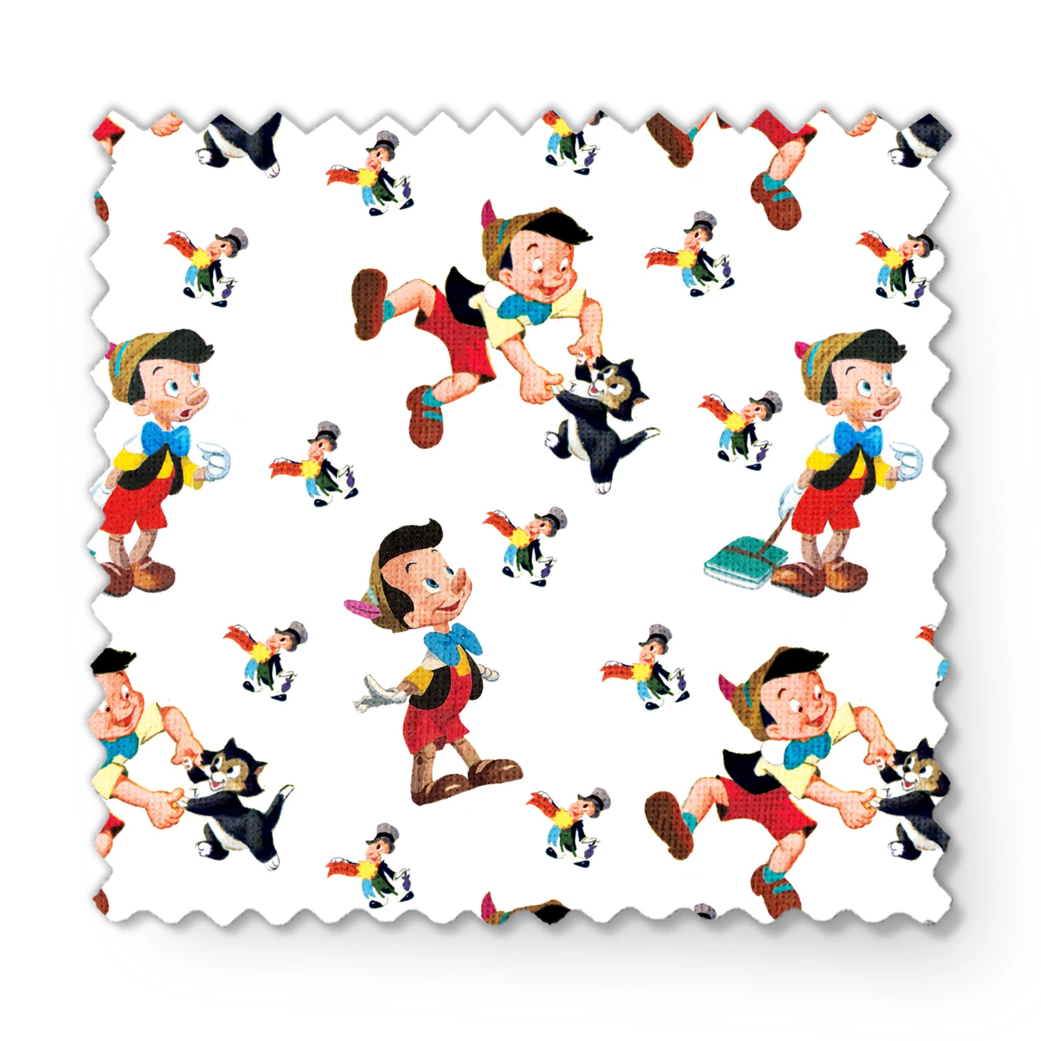 Pattern of cartoon wooden puppet characters with long noses, red shorts, blue bow ties, and black cats scattered on white background fabric swatch mockup