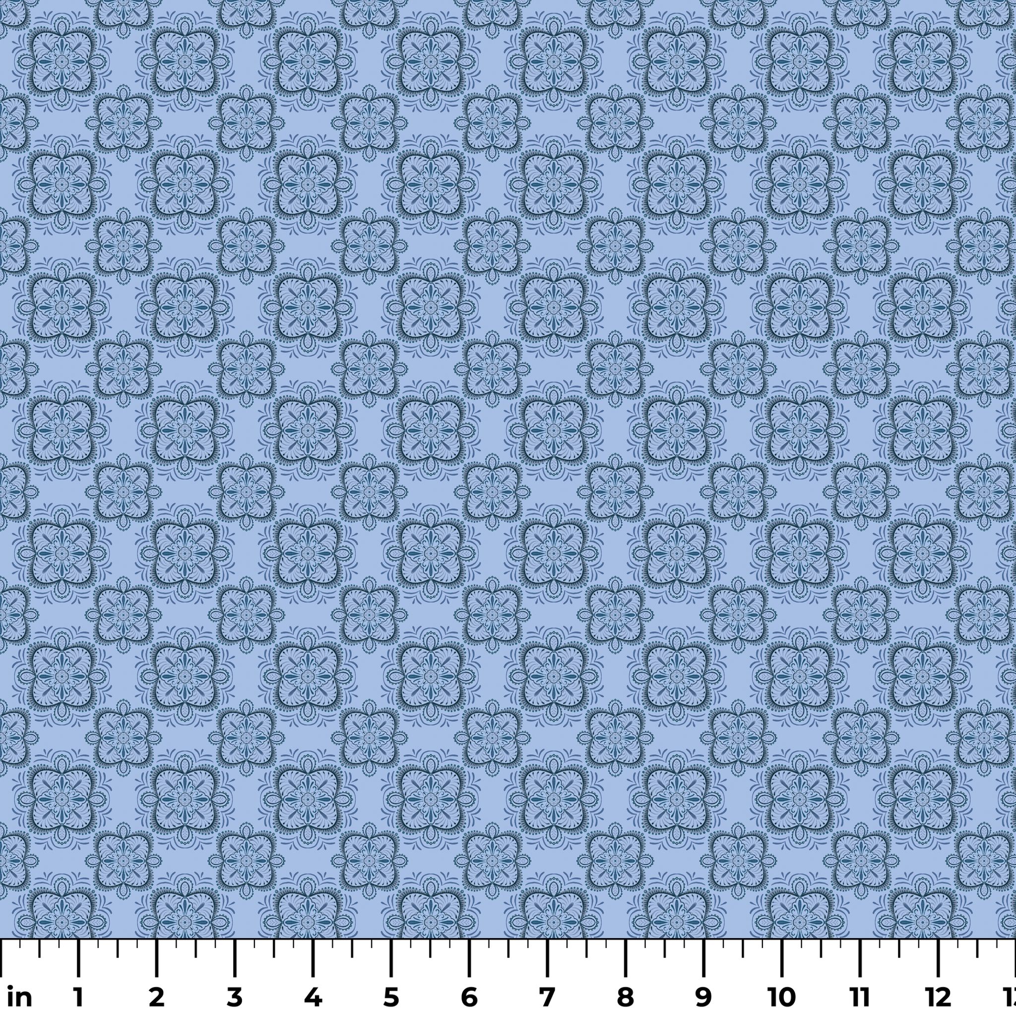 Symmetrical floral mandala pattern in layered blue tones with hand-drawn botanical details, designed by Nicole Tamarin. ruler