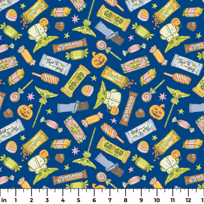 Colorful candy pattern with wrapped sweets, lollipops, and treats on dark blue background ruler