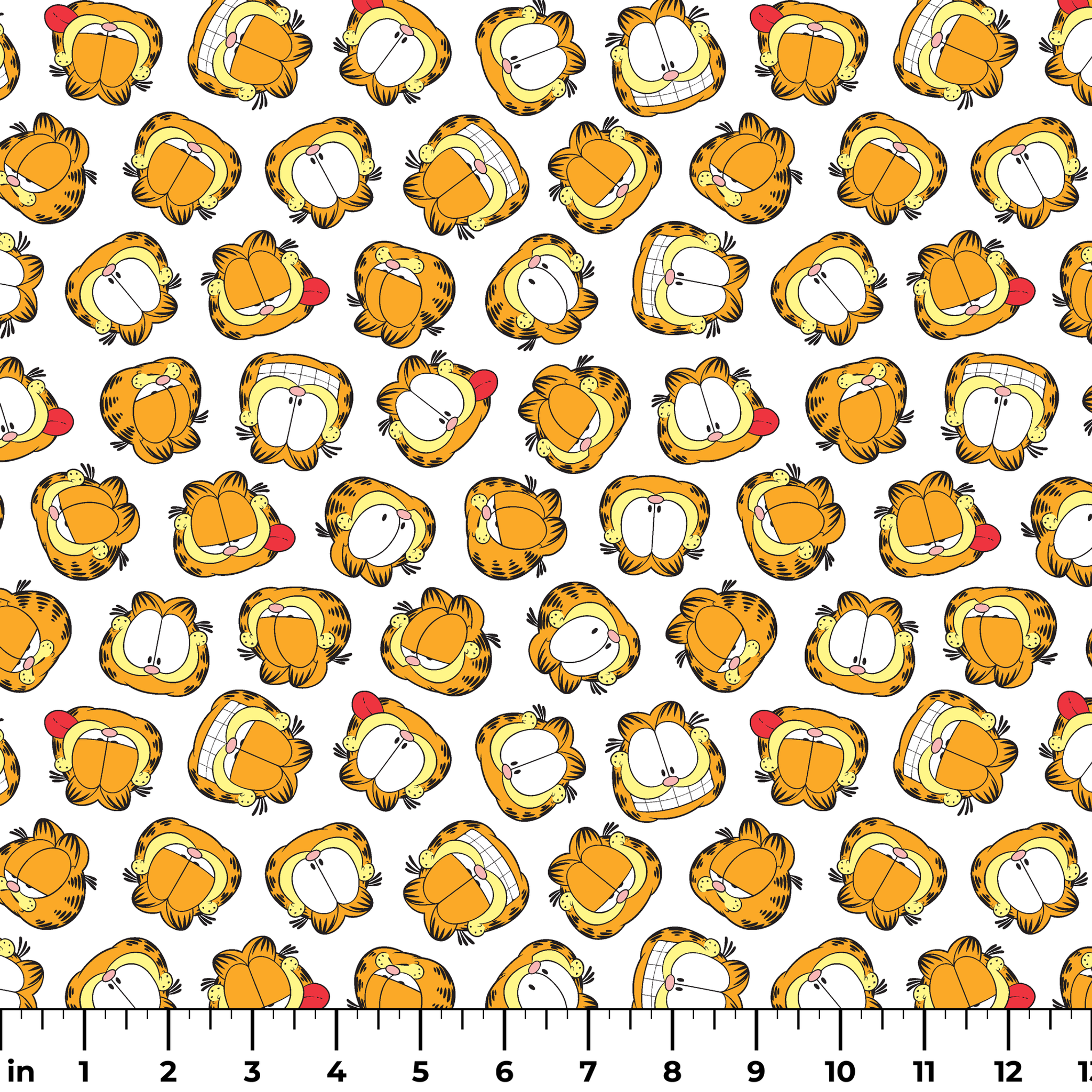 Pattern of cartoon cat faces with orange and yellow coloring against white background ruler