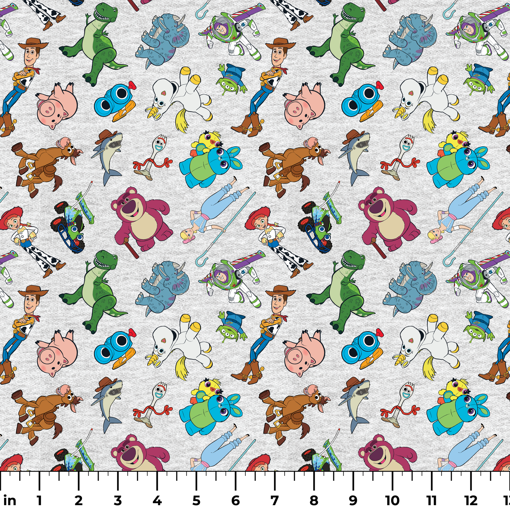 Colorful pattern of various animated Toy Story characters on a light speckled background ruler