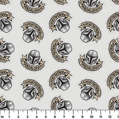 Star Wars Mandalorian helmet logo pattern with banners in black and gold on light background ruler