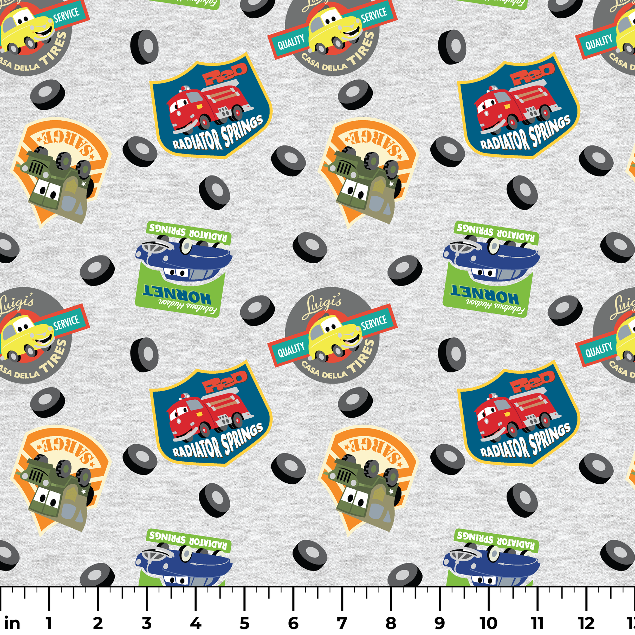 Cartoon vehicle characters on gray fabric with badges for Radiator Springs, Luigi's, and Sarge's ruler
