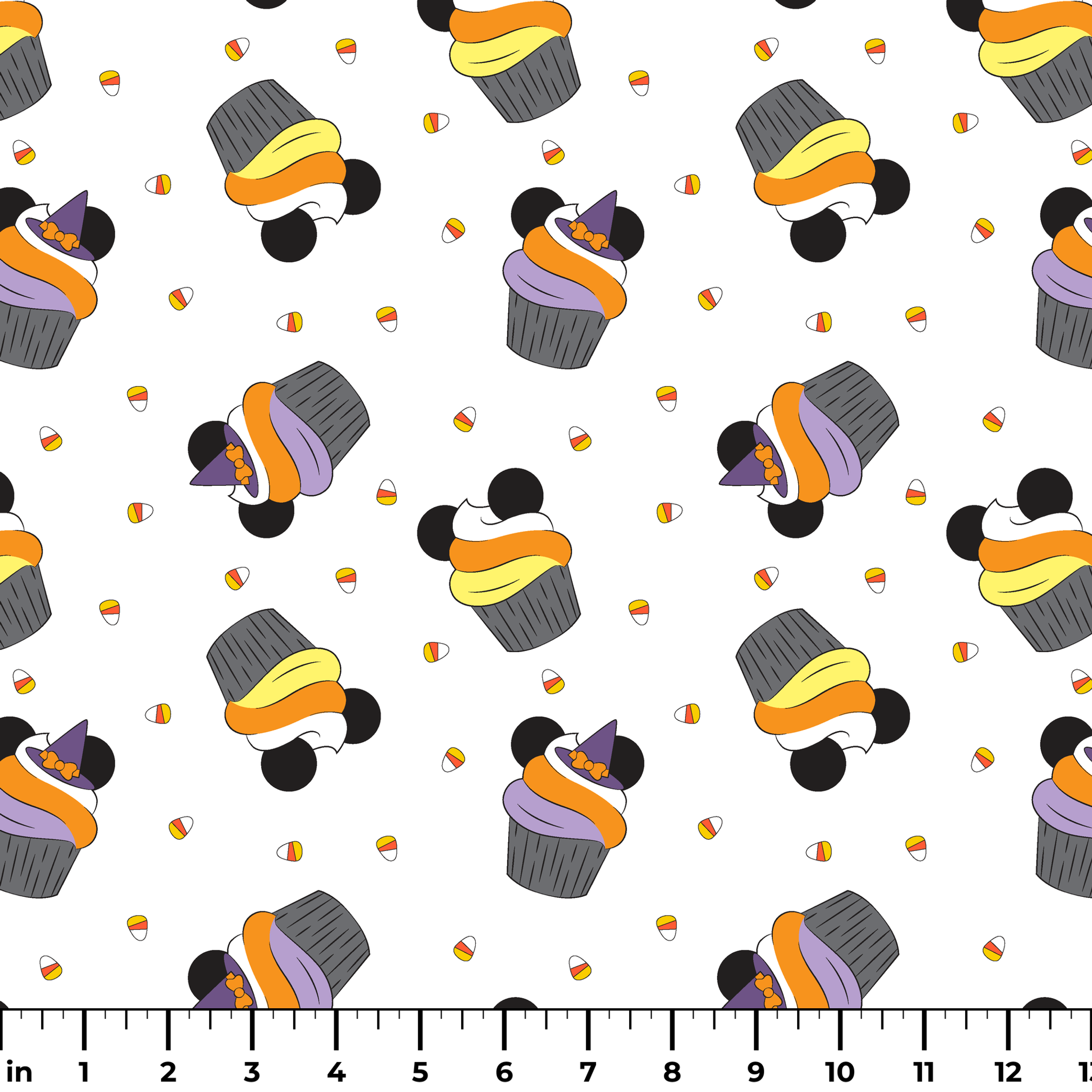 Disney cupcakes with black circular elements and colorful frosting in orange, yellow, and purple on a white background. ruler