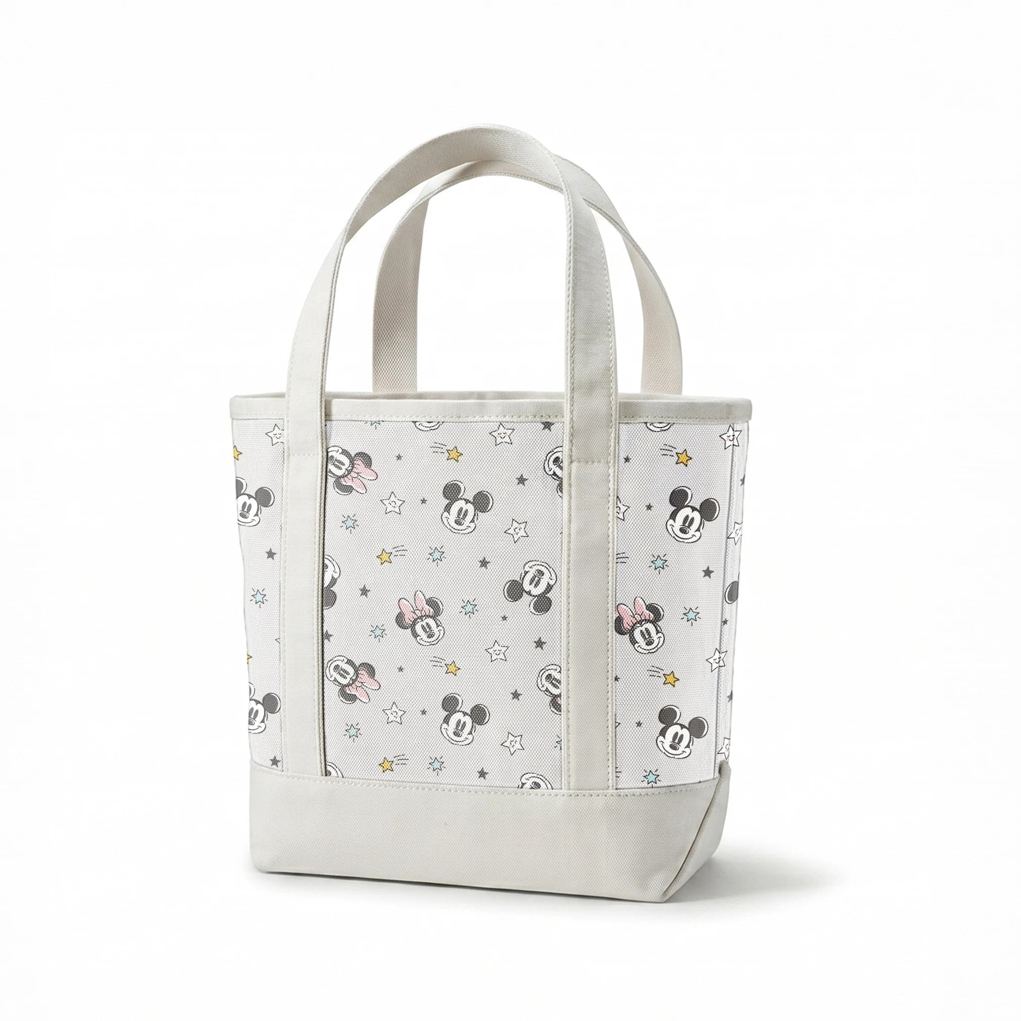 Mickey and Minnie Mouse pattern with stars on light gray background springs canvastote mockup