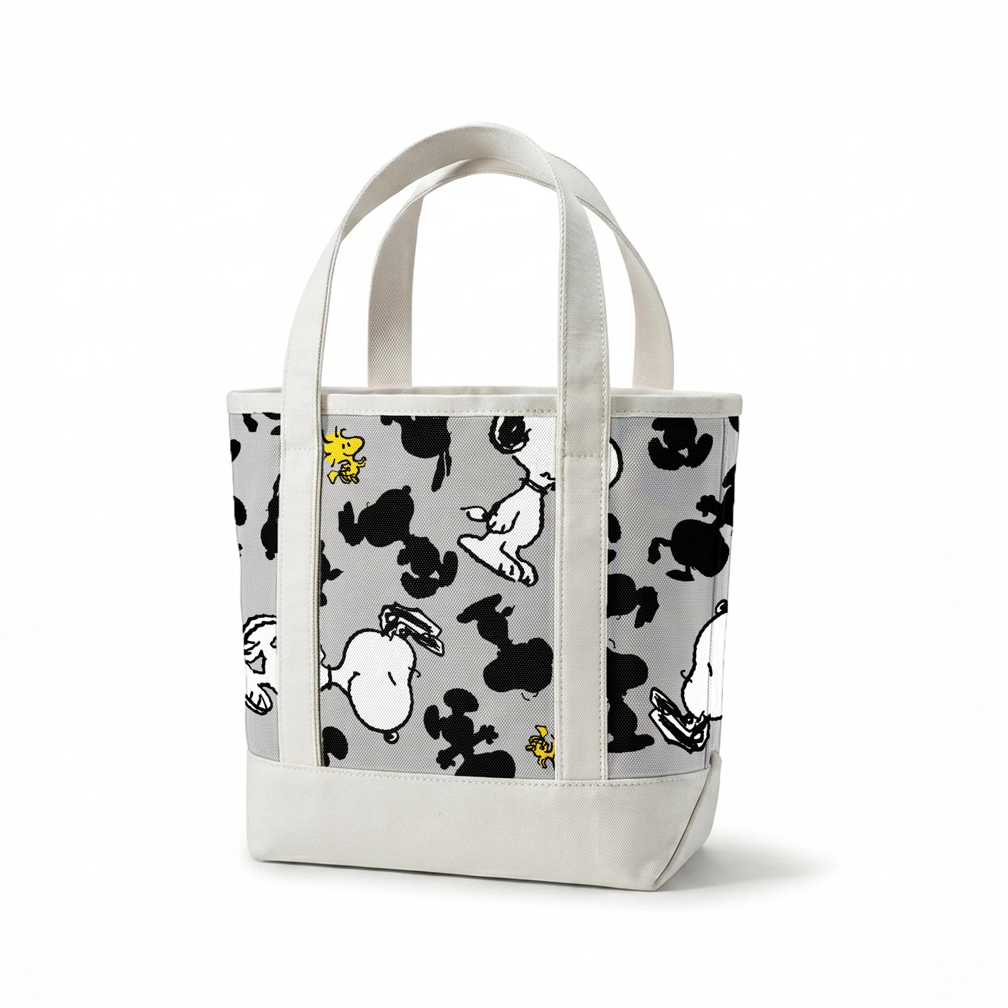 Pattern of Snoopy and Woodstock on gray background with black silhouettes springs canvastote mockup