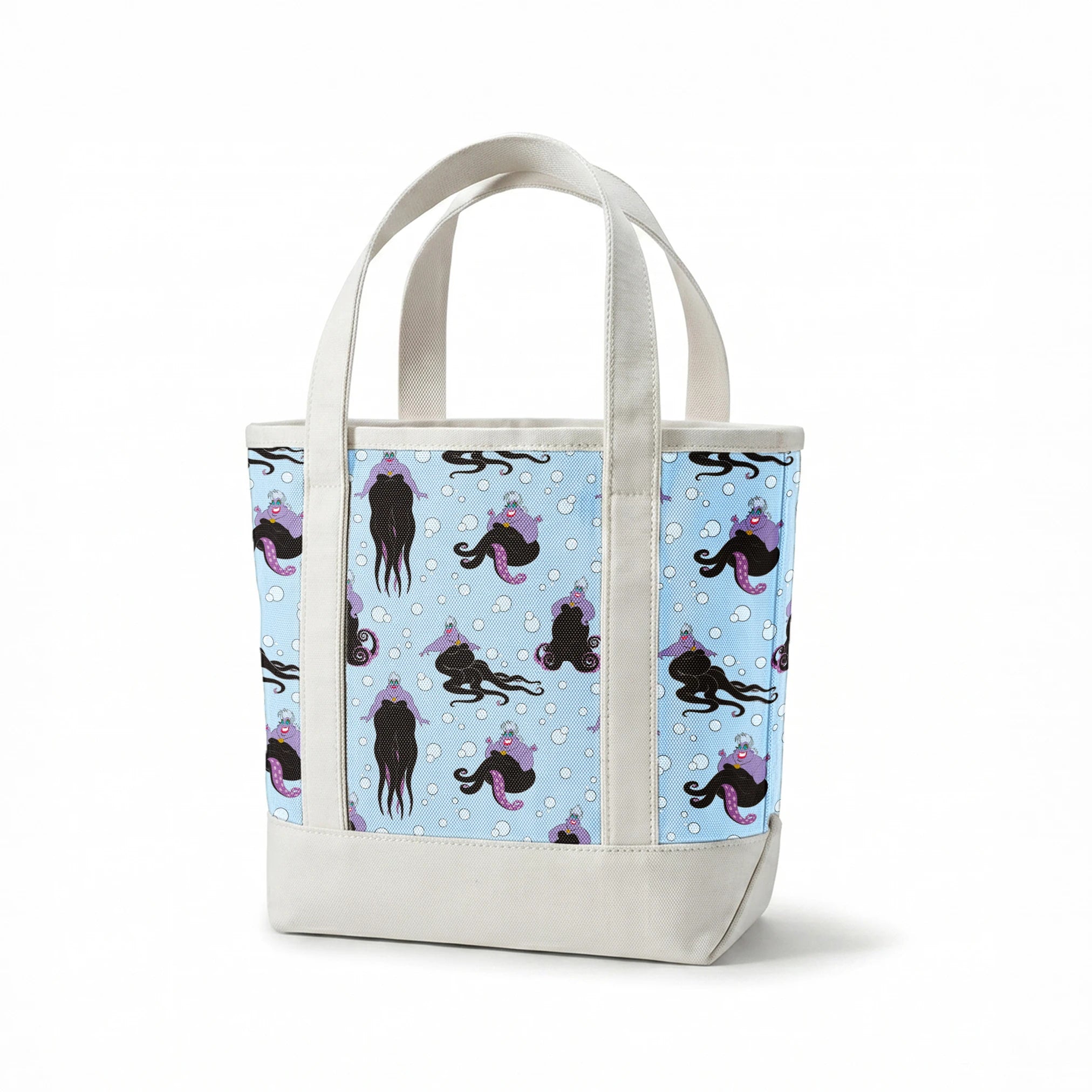 Ursula with black tentacles swimming in a light blue underwater scene with white bubbles springs canvastote mockup