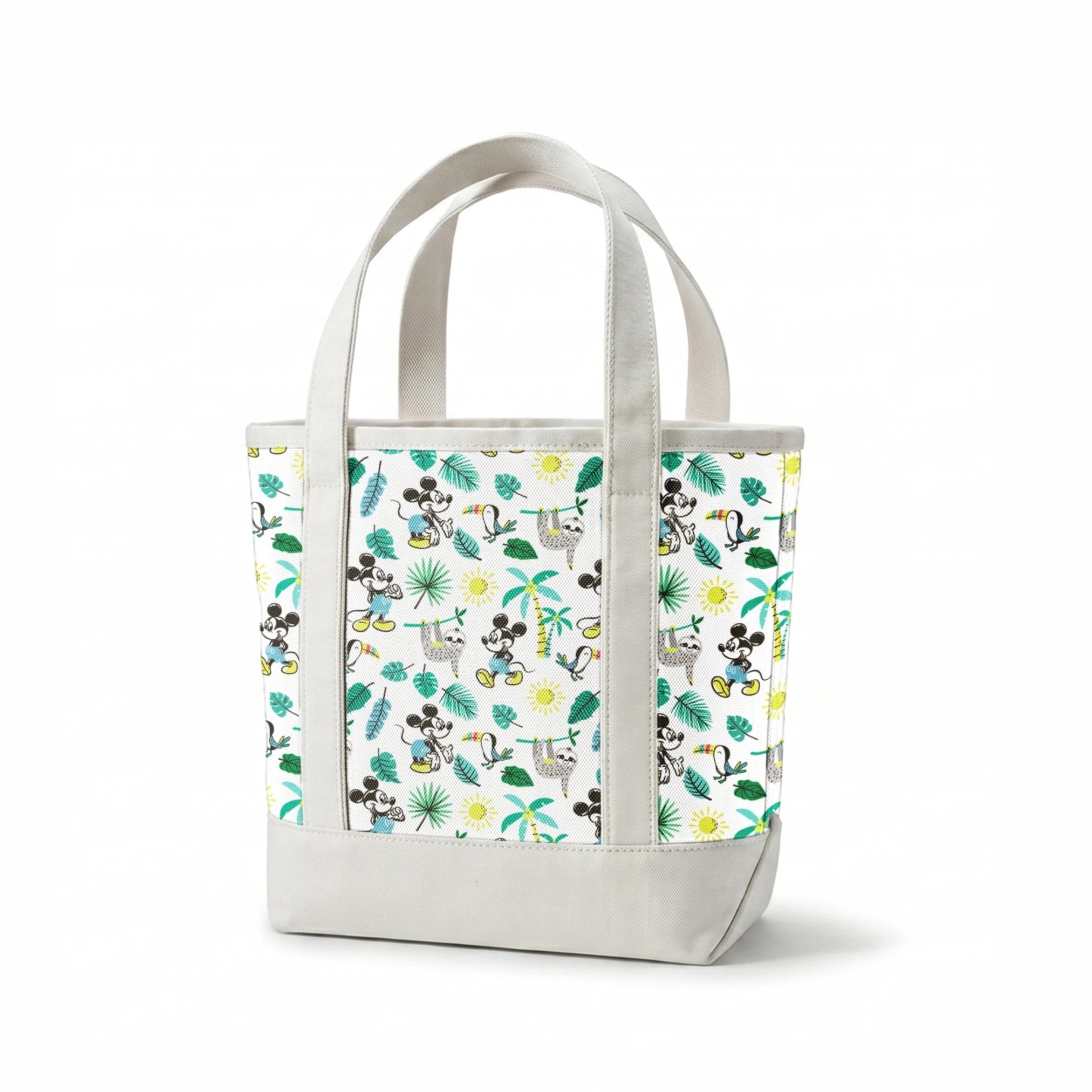 Tropical pattern with cartoon characters, sloths, toucans, palm leaves, and suns on white background springs canvastote mockup
