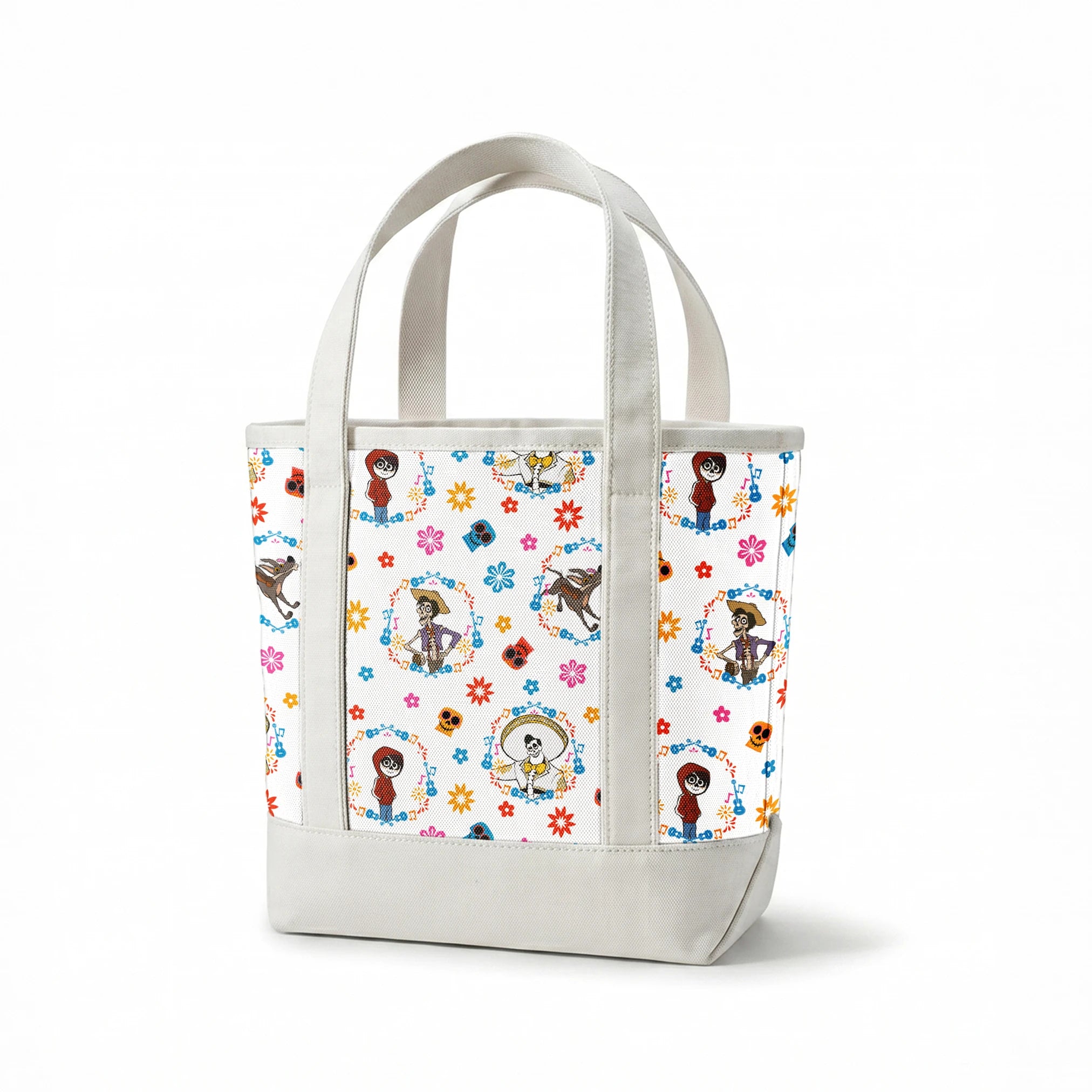 Colorful Coco pattern with Day of the Dead skeleton characters in floral wreaths, sugar skulls, and bright flowers on white background springs canvastote mockup