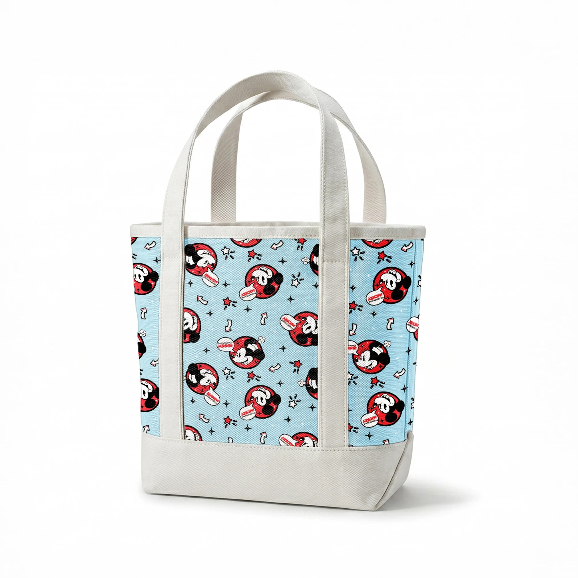 Disney Mickey Mouse pattern with red circular emblems on light blue background with stars and arrows springs canvastote mockup