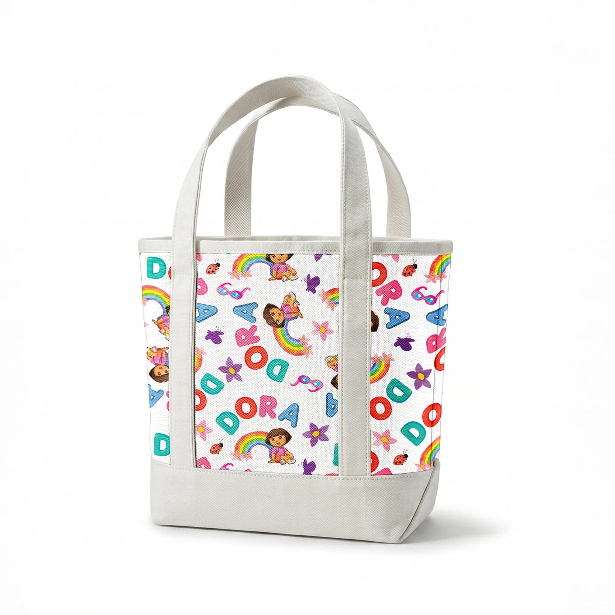 Colorful Dora pattern with rainbows, flowers, alongside scattered "DORA" letters on white background. springs canvastote mockup