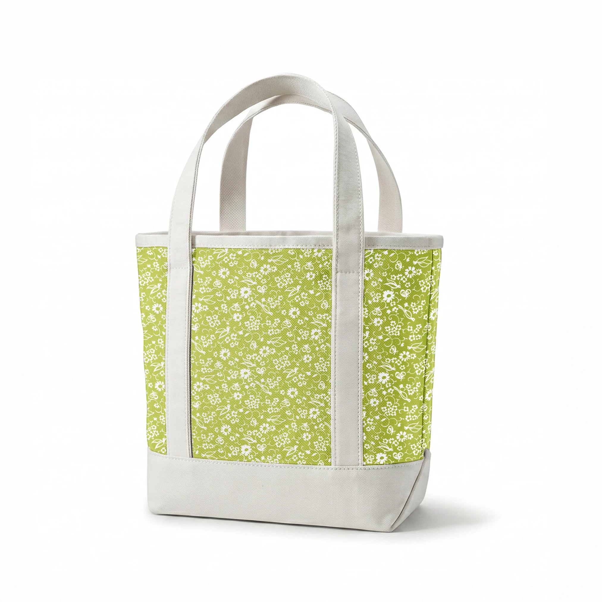 White bird and floral pattern on a vibrant lime green background. springs canvastote mockup