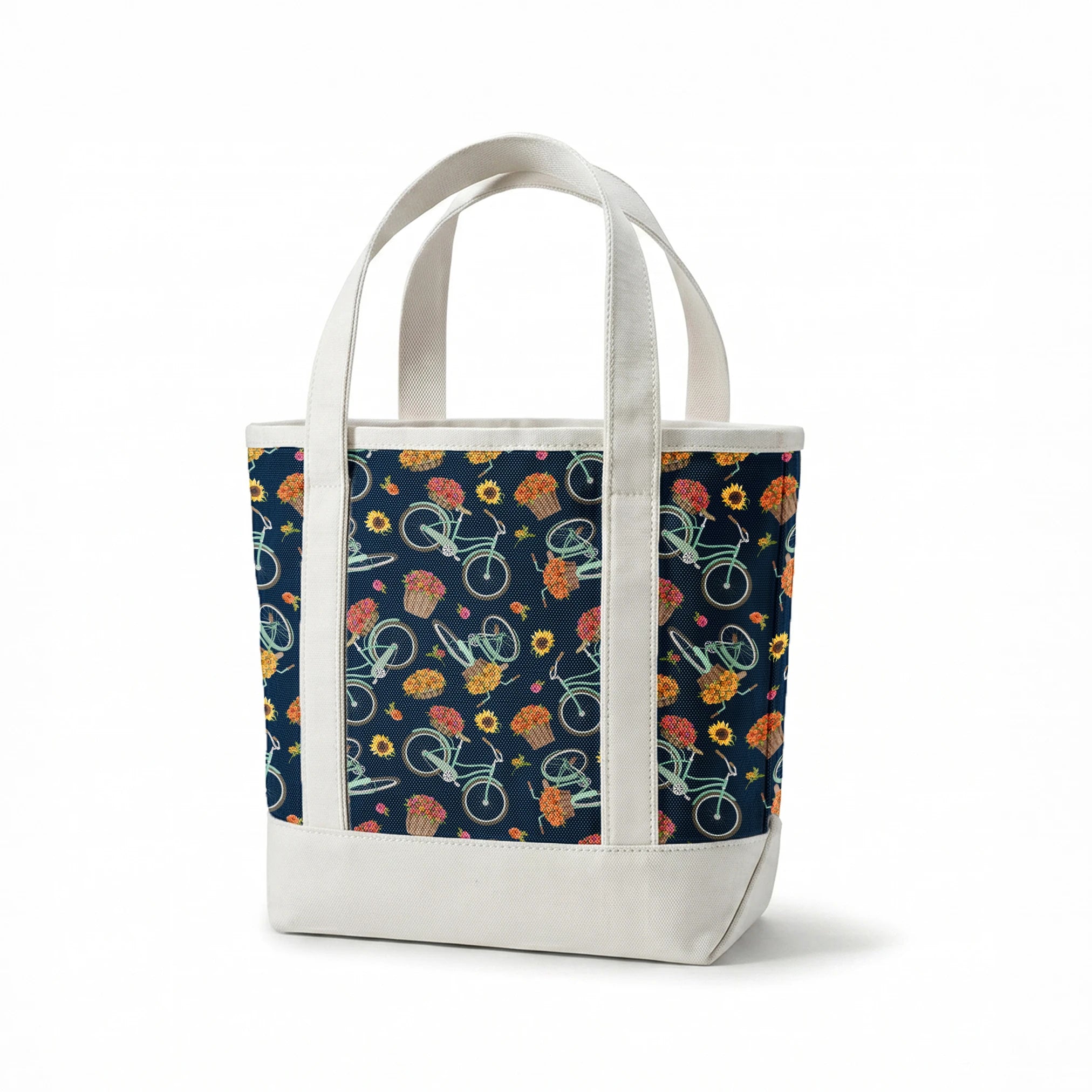 Teal vintage bikes with baskets of fall flowers on a navy background, inspired by cozy fall market scenes. springs canvastote mockup