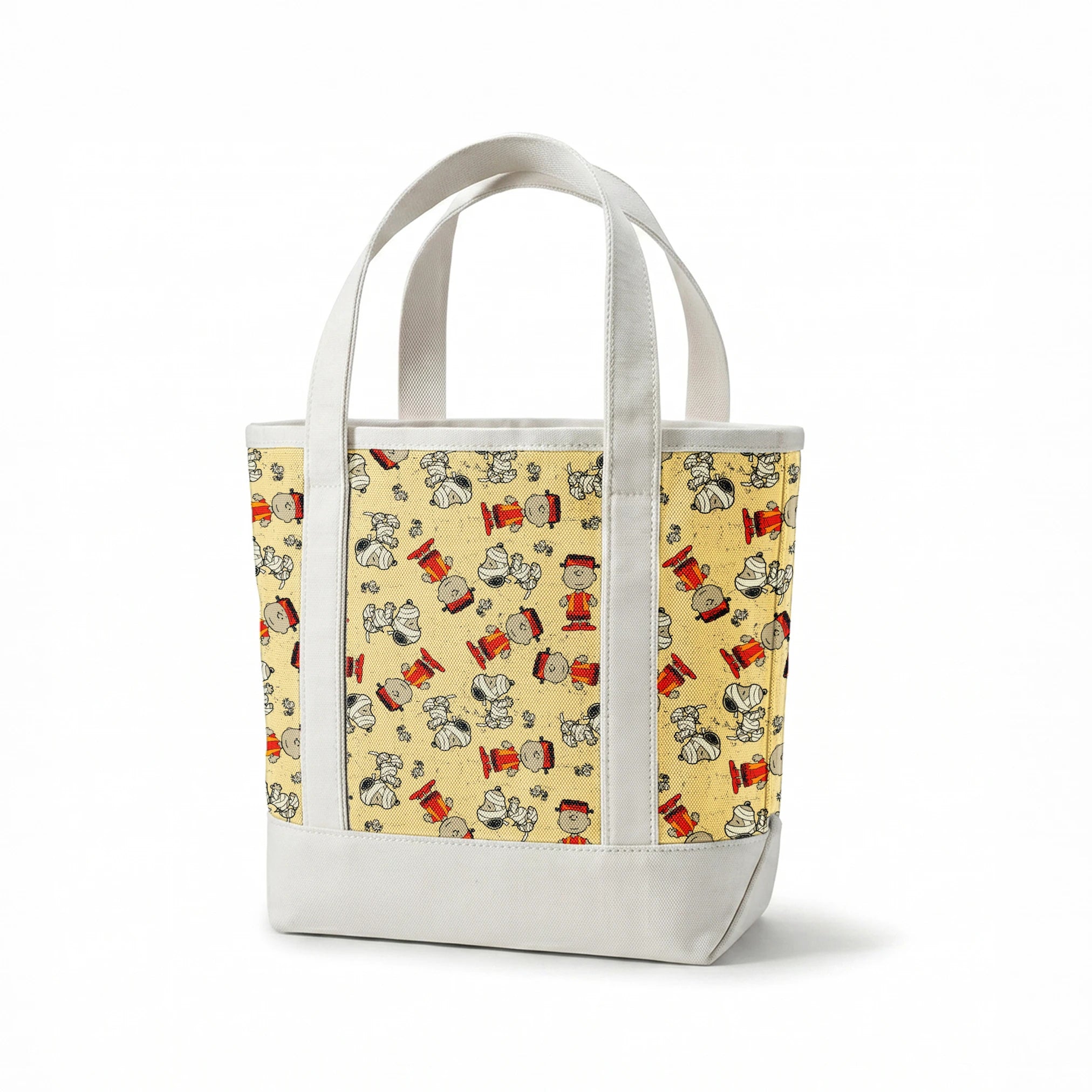 Peanuts characters pattern with Charlie Brown and Snoopy in halloween attire on beige background springs canvastote mockup