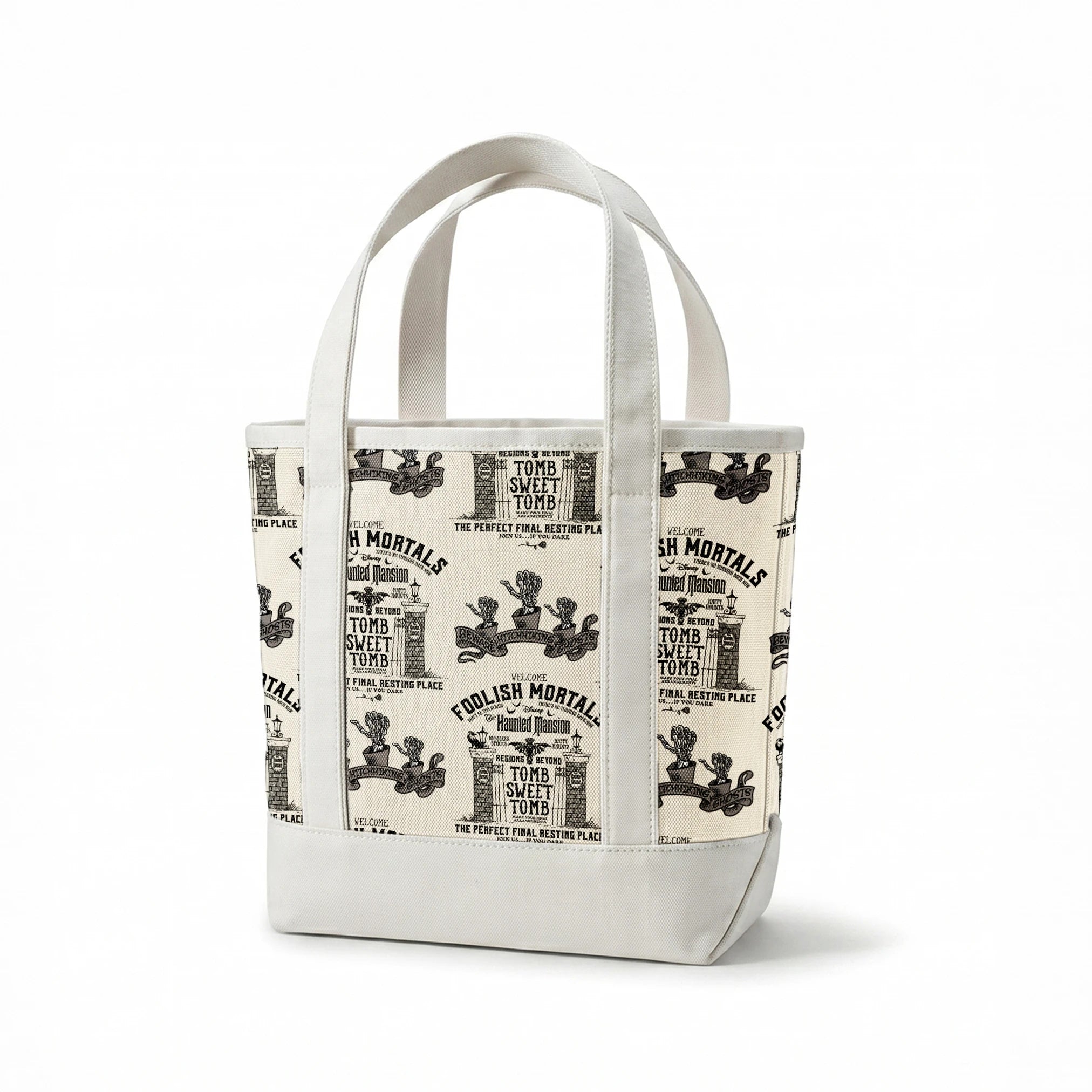 Repeating pattern of "Foolish Mortals" Haunted Mansion signage with ornate tomb designs in vintage black and cream style springs canvastote mockup