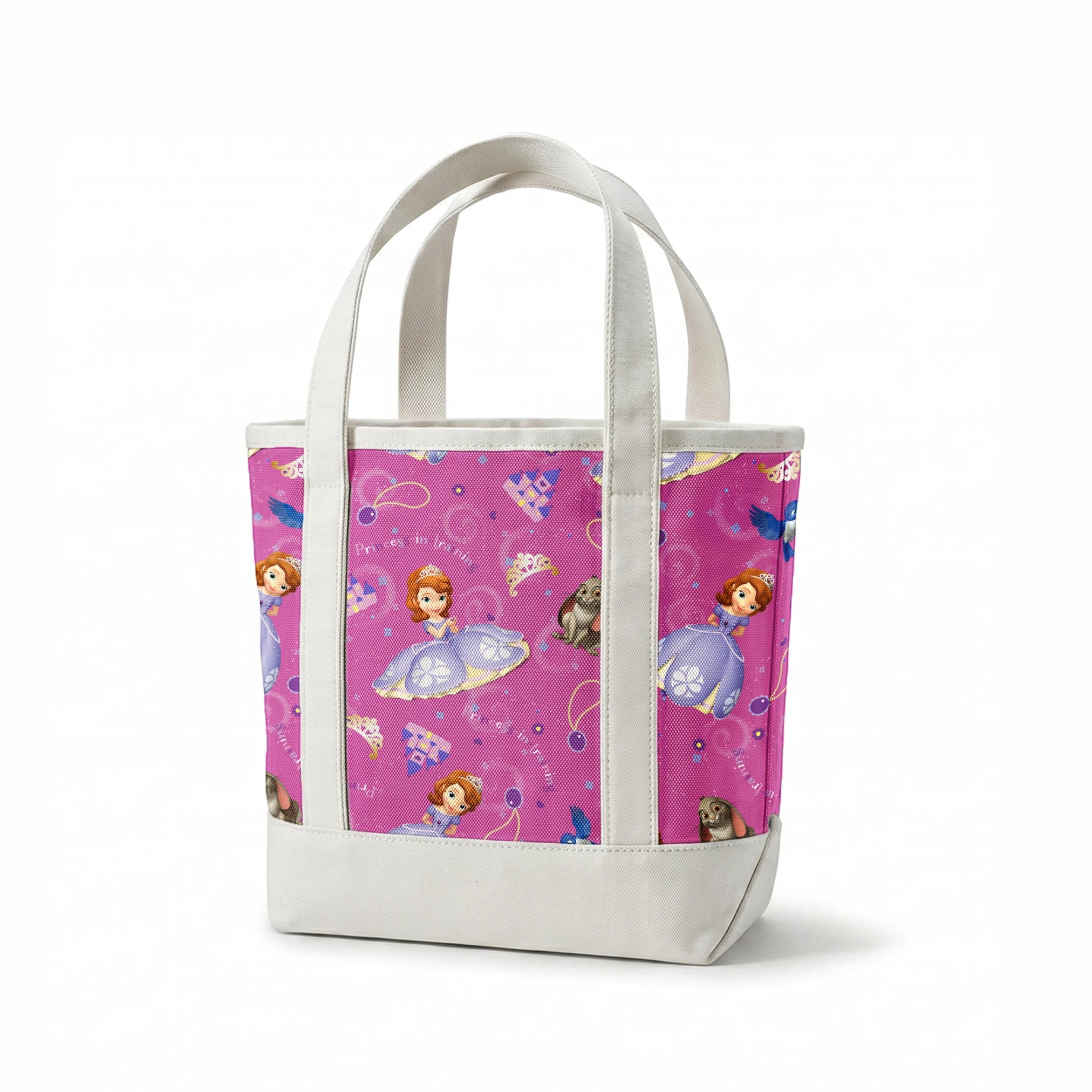 Princess Sofia pattern with purple background, crowns, castles, rabbits, and blue birds scattered among swirling designs springs canvastote mockup