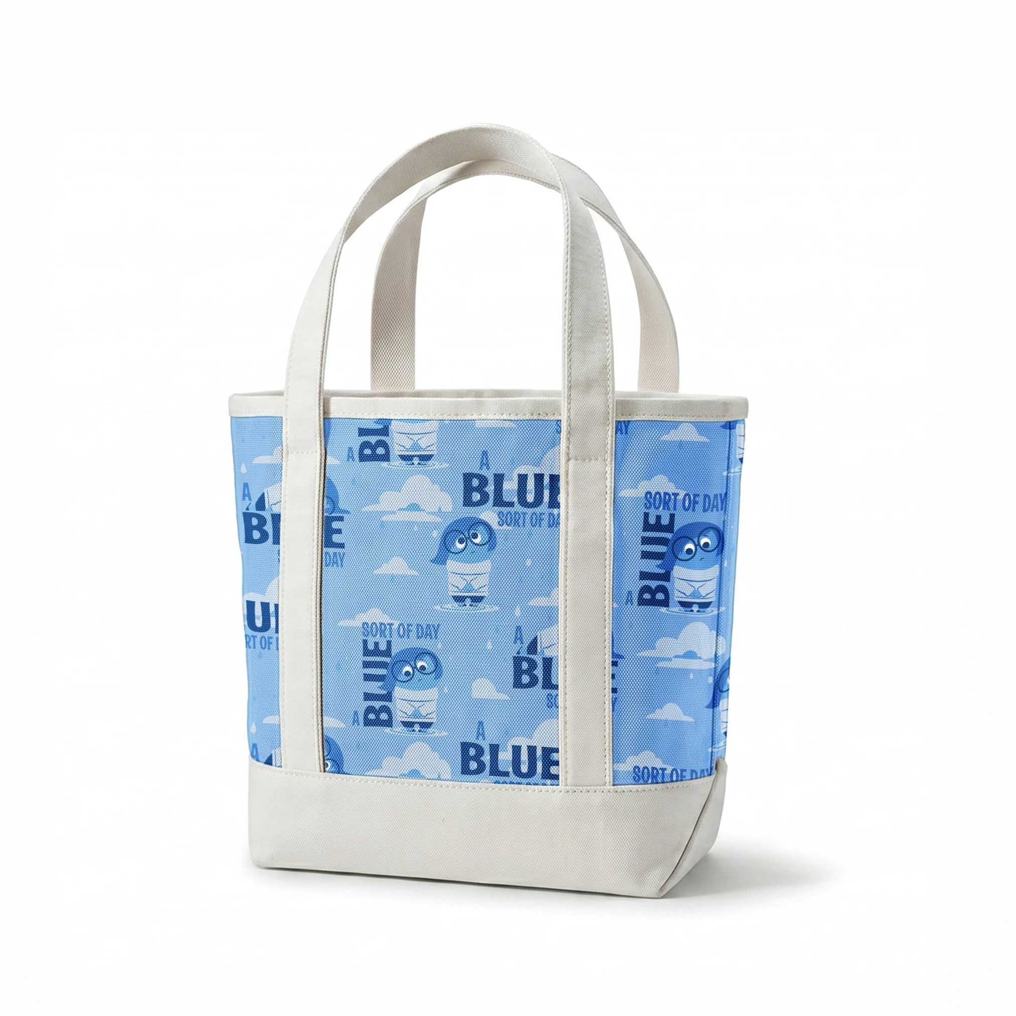 Sadness from Disney and Pixar's Inside Out pattern with "BLUE SORT OF DAY" text on light blue background with clouds springs canvastote mockup