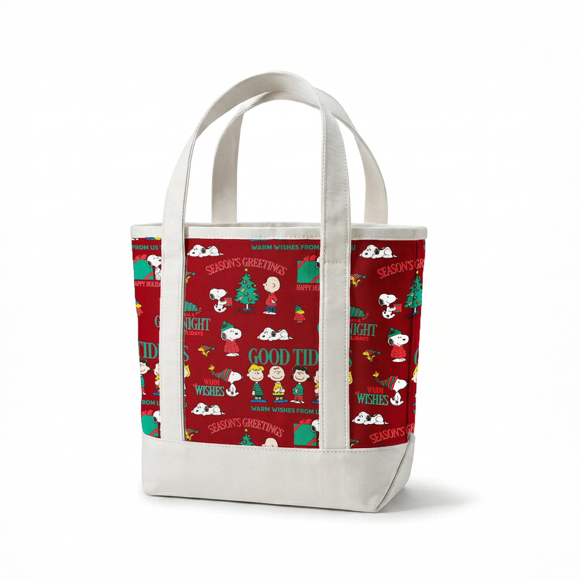 Colorful Peanuts Christmas pattern with Snoopy, Woodstock, and friends with holiday phrases on red background springs canvastote mockup