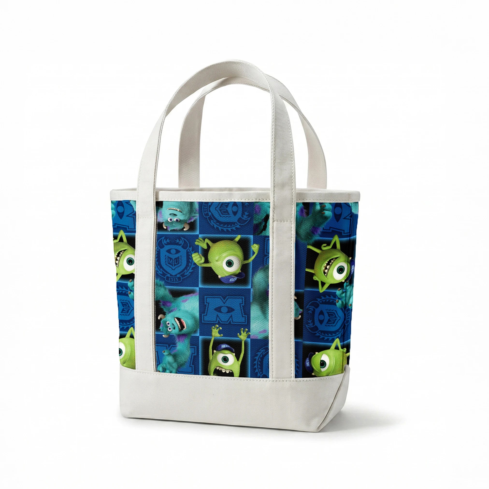 Monsters Inc characters pattern with Mike and Sulley on blue background with logos and emblems springs canvastote mockup