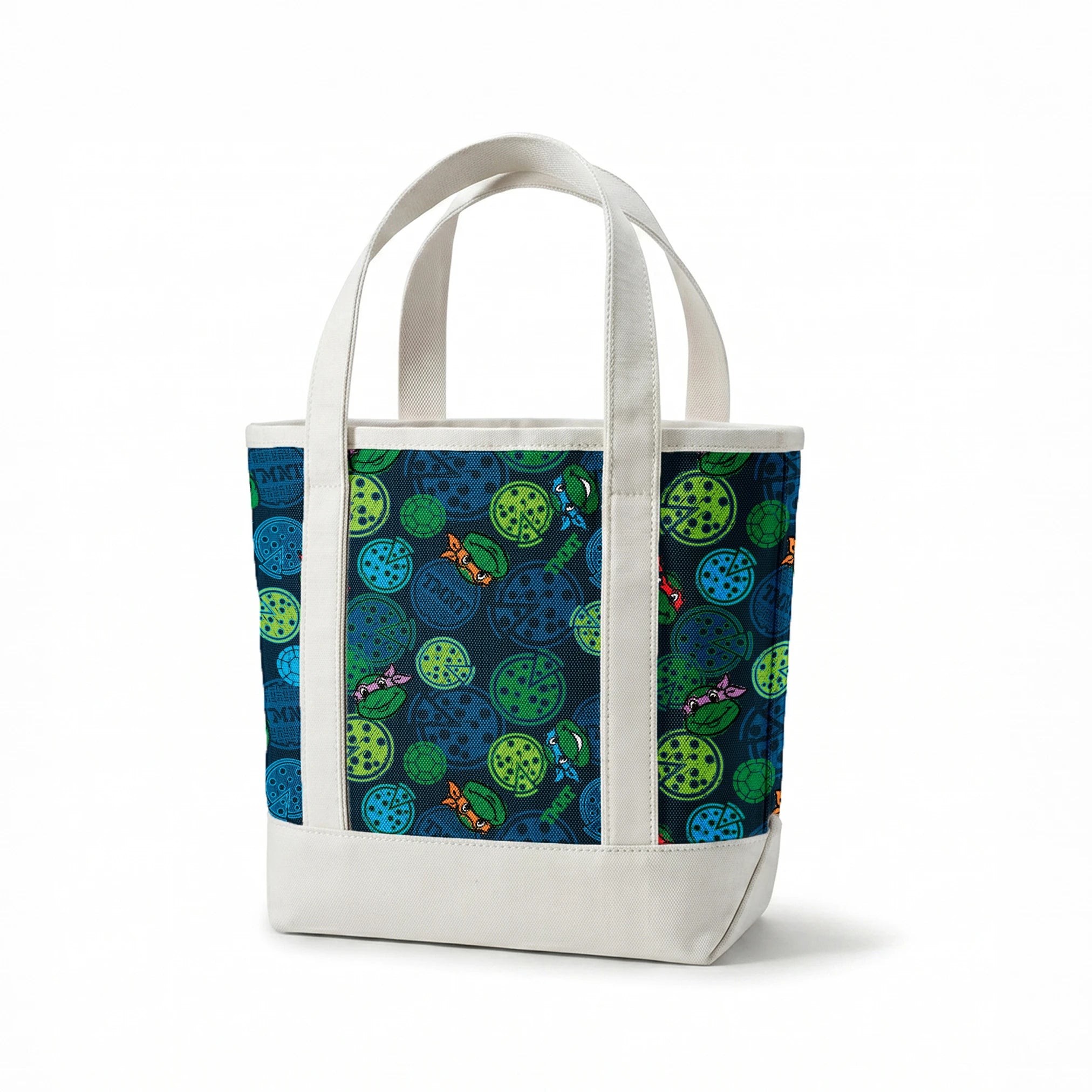 Teenage Mutant Ninja Turtles pattern with cartoon character heads and green/blue pizza circles springs canvastote mockup