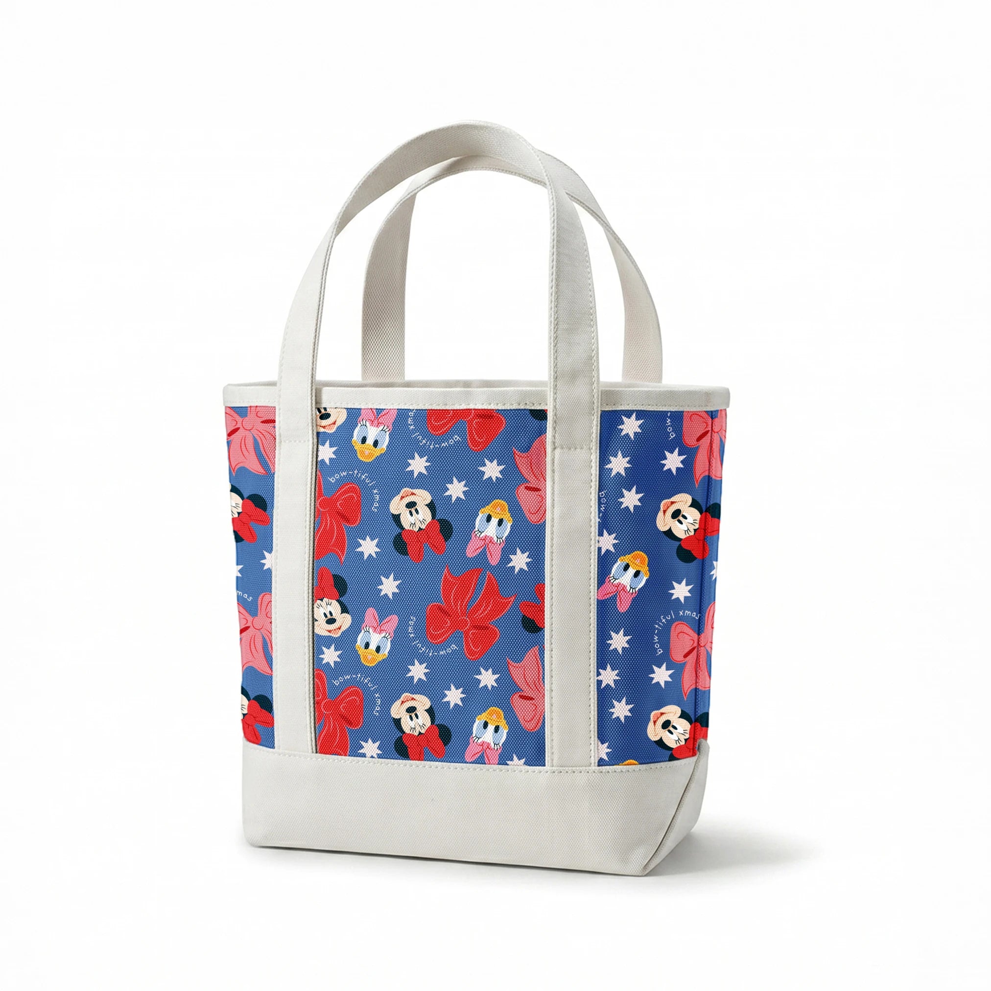 Disney character pattern with Minnie Mouse, Daisy Duck, and pink/red bows on blue background with white stars springs canvastote mockup