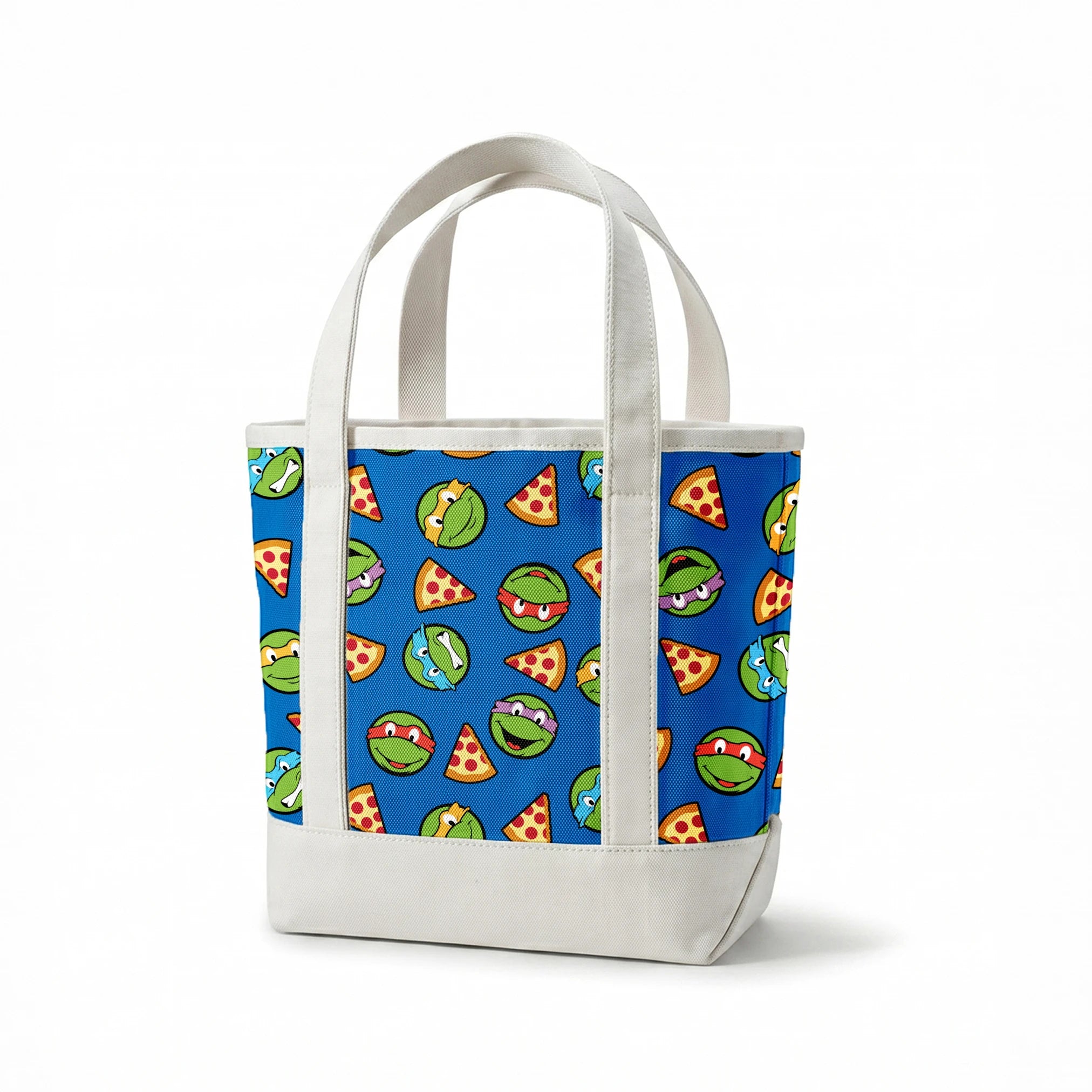 Teenage Mutant Ninja Turtle faces with colored masks and pizza slices pattern on blue background springs canvastote mockup